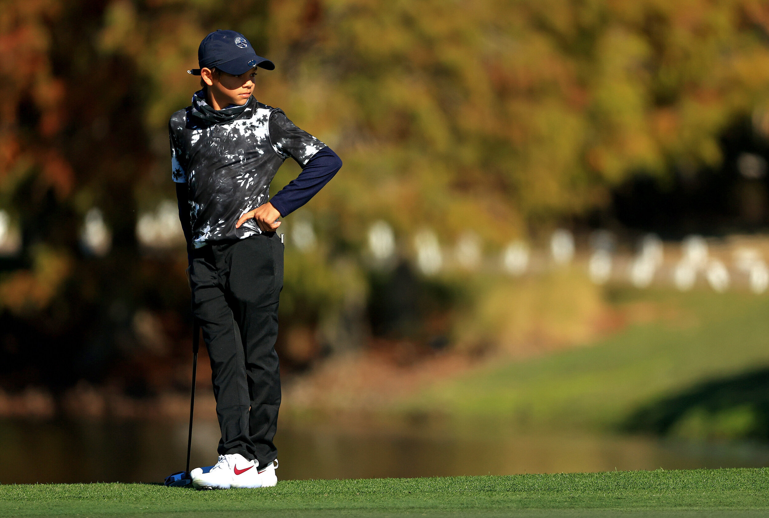  ORLANDO, FLORIDA - DECEMBER 18: Charlie Woods looks on on the 18th hole during the Pro-Am for the PNC Championship at the Ritz Carlton Golf Club on December 18, 2020 in Orlando, Florida. (Photo by Mike Ehrmann/Getty Images) 