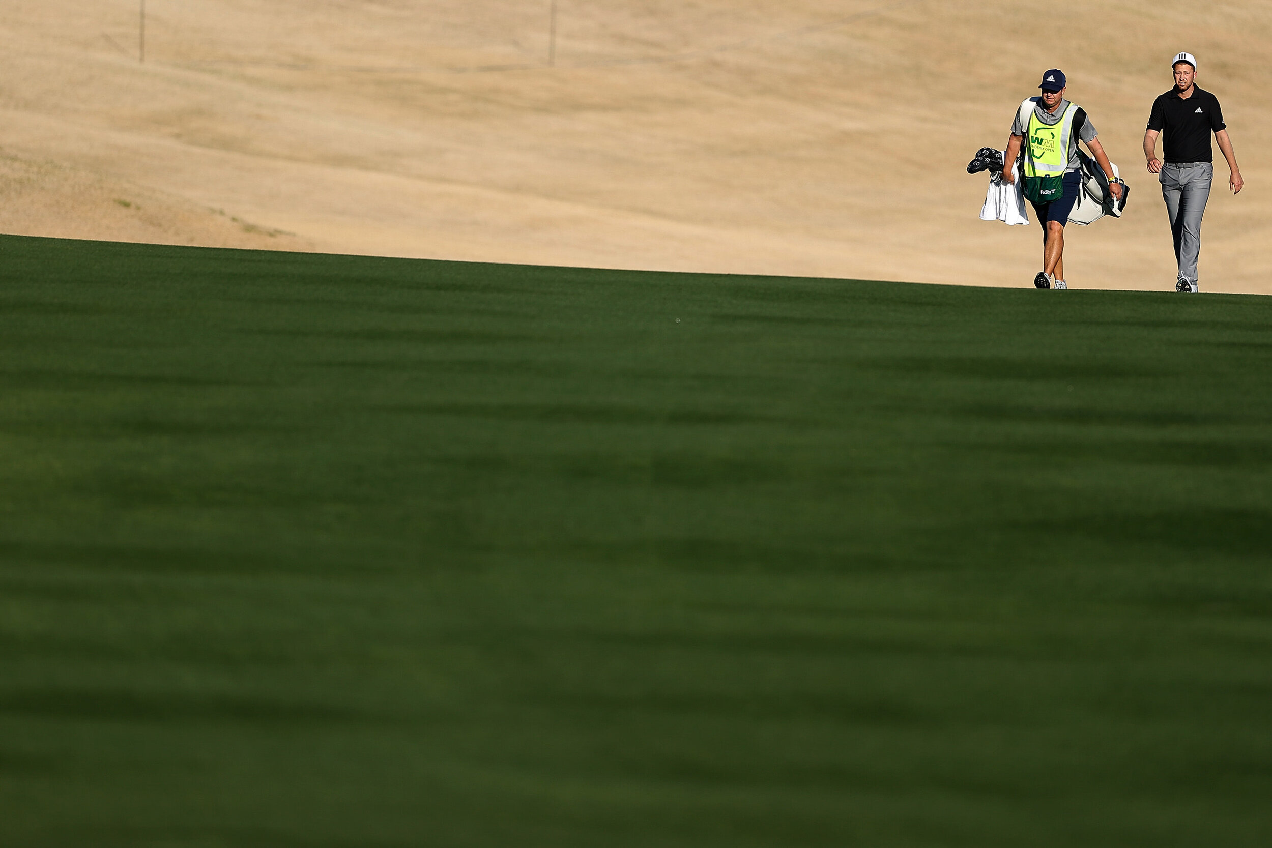  SCOTTSDALE, ARIZONA - FEBRUARY 04: Daniel Berger of the United States walks up the 14th fairway during the first round of the Waste Management Phoenix Open at TPC Scottsdale on February 04, 2021 in Scottsdale, Arizona. (Photo by Christian Petersen/G