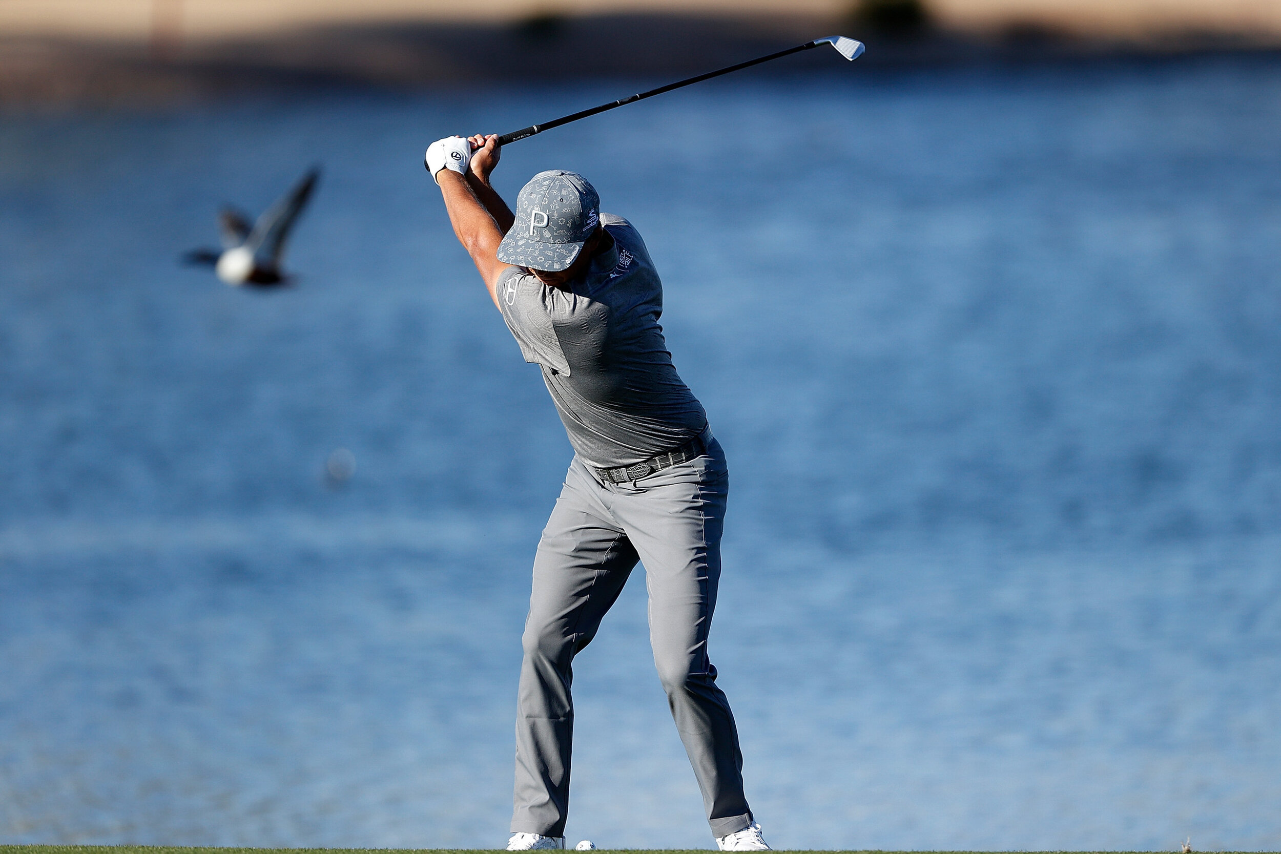  SCOTTSDALE, ARIZONA - FEBRUARY 05: Rickie Fowler of the United States hits his second shot on the 15th hole during the second round of the Waste Management Phoenix Open at TPC Scottsdale on February 05, 2021 in Scottsdale, Arizona. (Photo by Christi