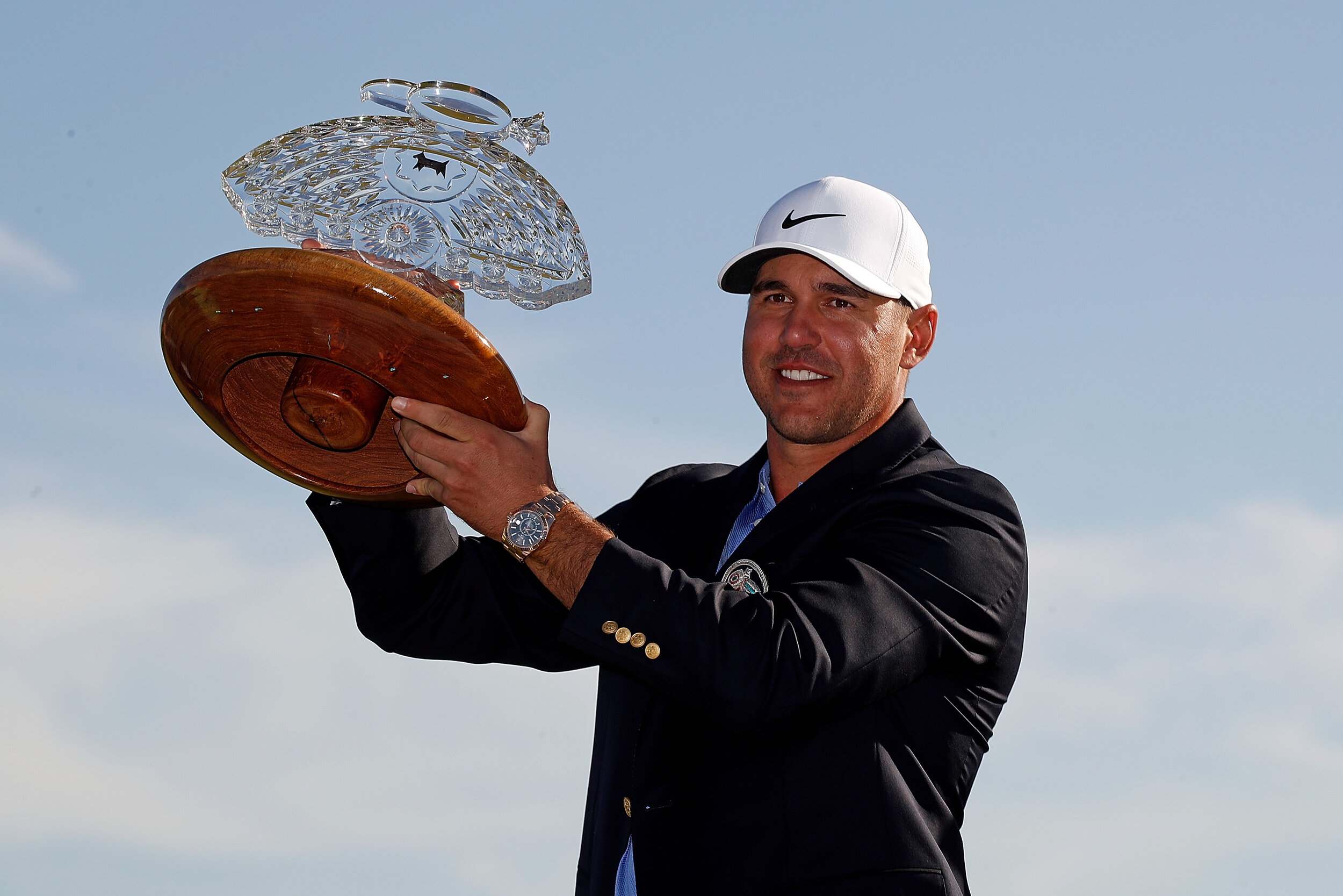  SCOTTSDALE, ARIZONA - FEBRUARY 07: Brooks Koepka of the United States poses with the trophy after winning the Waste Management Phoenix Open at TPC Scottsdale on February 07, 2021 in Scottsdale, Arizona. (Photo by Christian Petersen/Getty Images) 