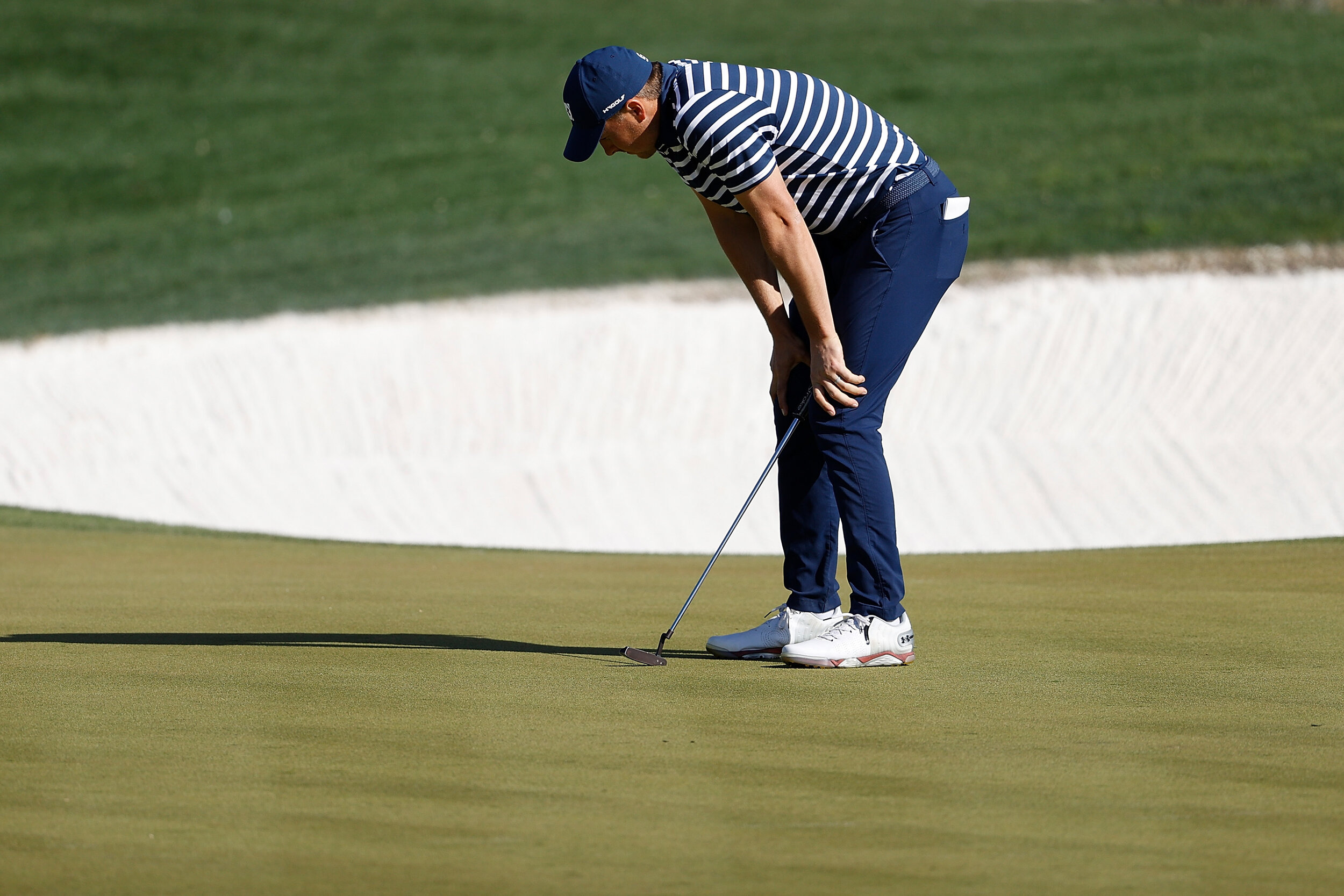  SCOTTSDALE, ARIZONA - FEBRUARY 07: Jordan Spieth of the United States reacts to a putt on the 12th green during the final round of the Waste Management Phoenix Open at TPC Scottsdale on February 07, 2021 in Scottsdale, Arizona. (Photo by Christian P