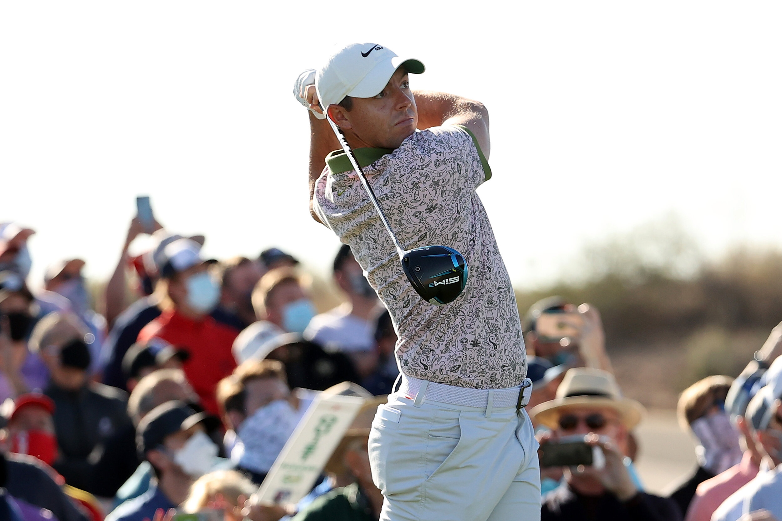  SCOTTSDALE, ARIZONA - FEBRUARY 07: Rory McIlroy of Northern Ireland hits his tee shot on the 11th hole during the final round of the Waste Management Phoenix Open at TPC Scottsdale on February 07, 2021 in Scottsdale, Arizona. (Photo by Abbie Parr/Ge