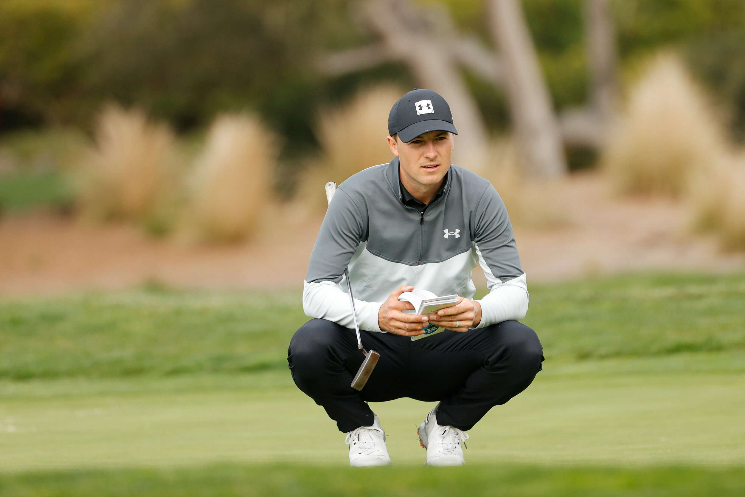  PEBBLE BEACH, CALIFORNIA - FEBRUARY 11: Jordan Spieth of the United States lines up a putt during the first round of the AT&T Pebble Beach Pro-Am at Pebble Beach Golf Links on February 11, 2021 in Pebble Beach, California. (Photo by Ezra Shaw/Getty 