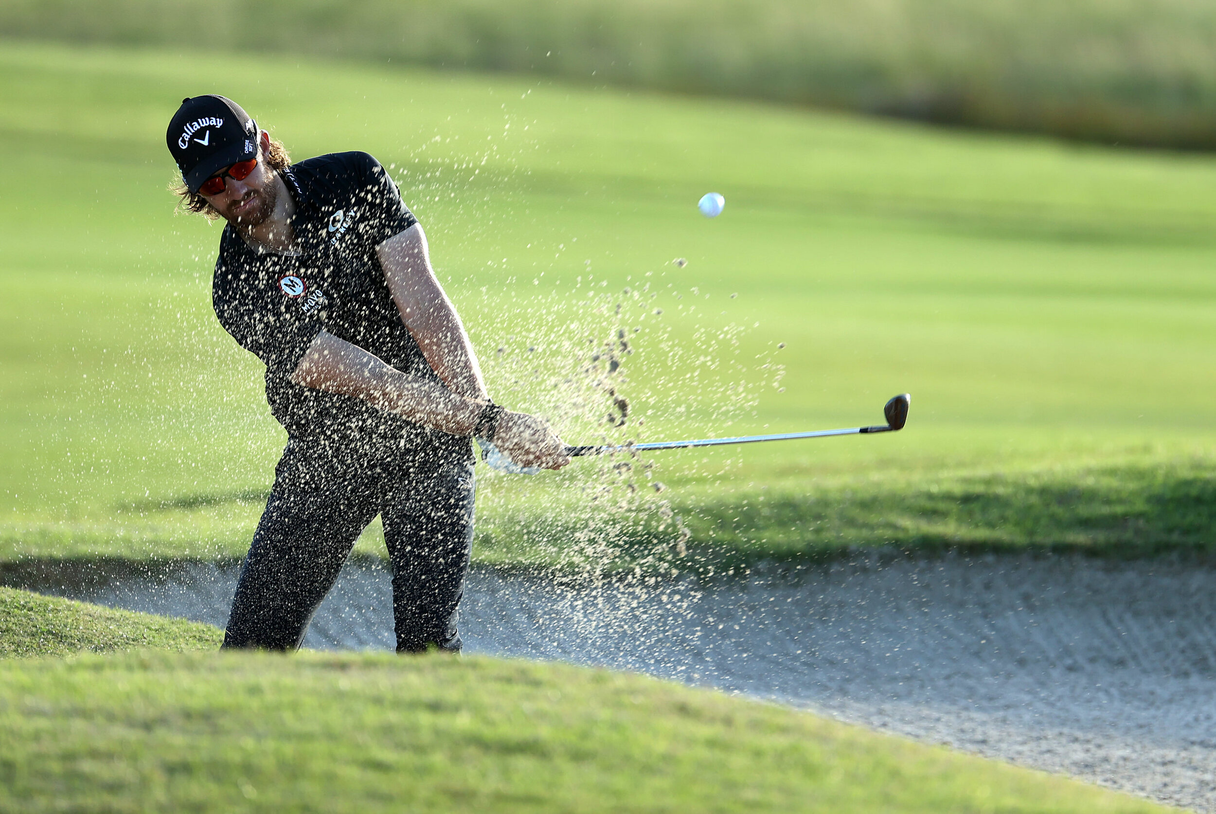  RIO GRANDE, PUERTO RICO - FEBRUARY 25: Patrick Rodgers plays a shot from a bunker on the second hole during the first round of the Puerto Rico Open at Grand Reserve Country Club on February 25, 2021 in Rio Grande, Puerto Rico.  (Photo by Andy Lyons/