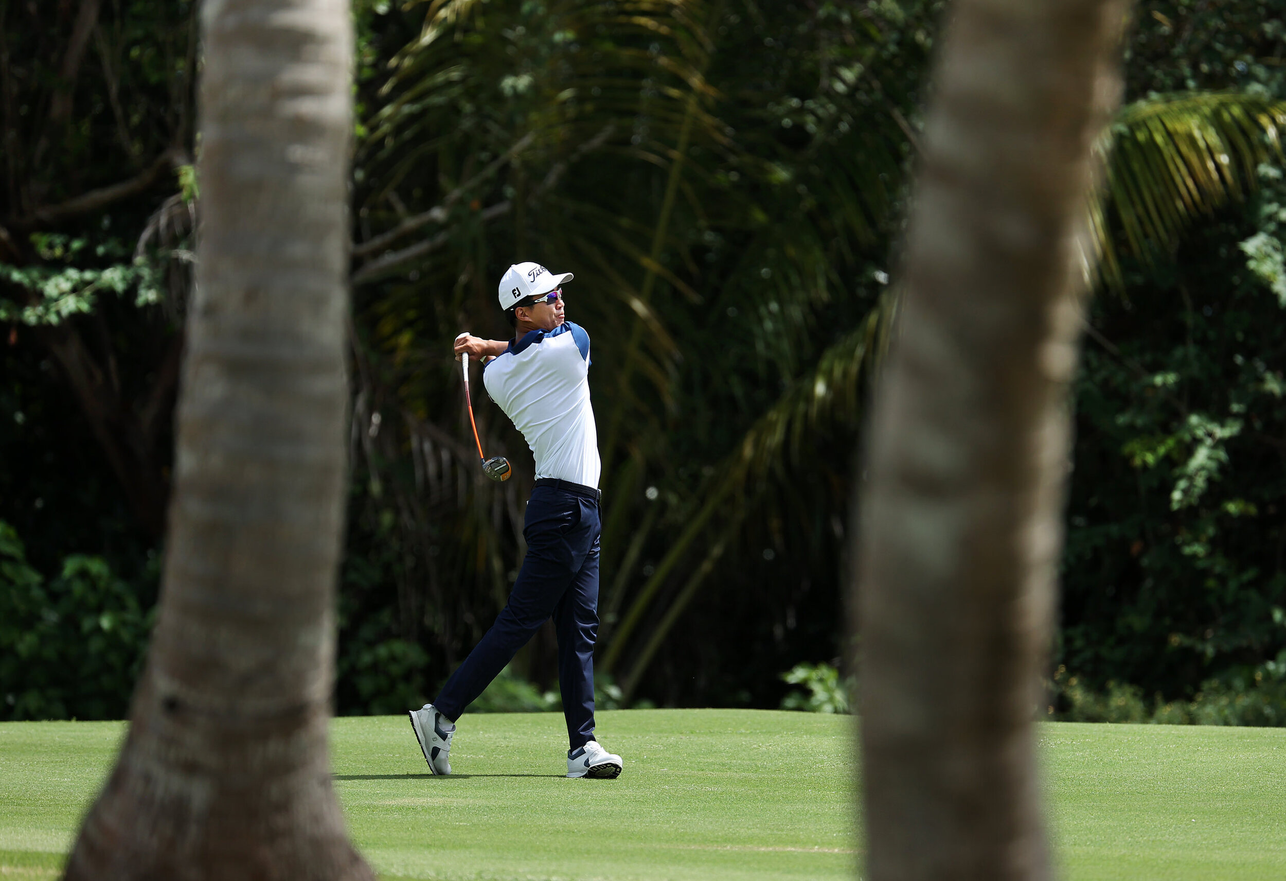 RIO GRANDE, PUERTO RICO - FEBRUARY 25: Michael Kim plays his second shot on the 18th hole during the first round of the Puerto Rico Open at Grand Reserve Country Club on February 25, 2021 in Rio Grande, Puerto Rico.  (Photo by Andy Lyons/Getty Image