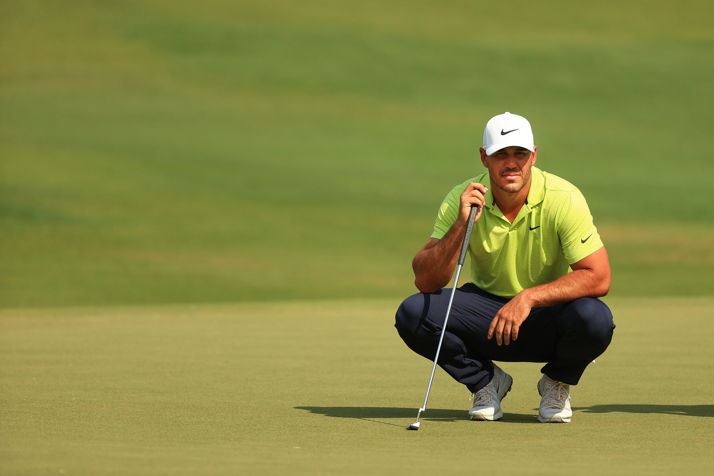  BRADENTON, FLORIDA - FEBRUARY 27: Brooks Koepka of the United States lines up a putt on the third hole during the third round of the World Golf Championships-Workday Championship at The Concession on February 27, 2021 in Bradenton, Florida. (Photo b