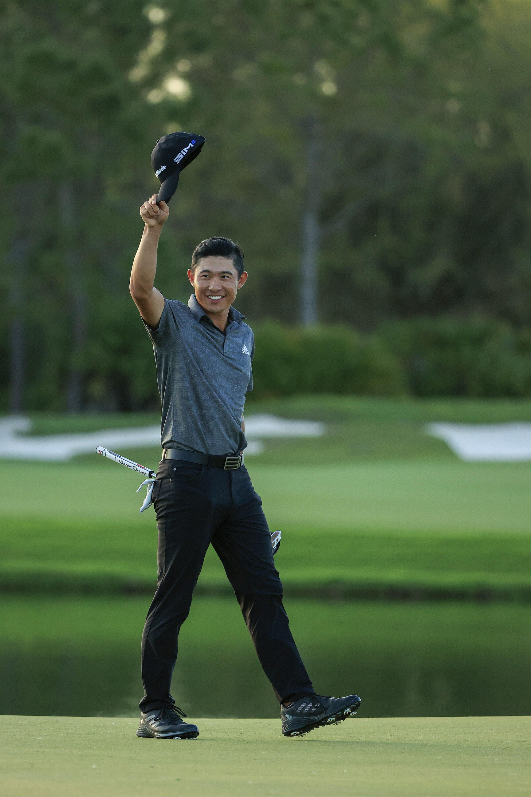  BRADENTON, FLORIDA - FEBRUARY 28: Collin Morikawa of the United States celebrates winning on the 18th green during the final round of World Golf Championships-Workday Championship at The Concession on February 28, 2021 in Bradenton, Florida. (Photo 