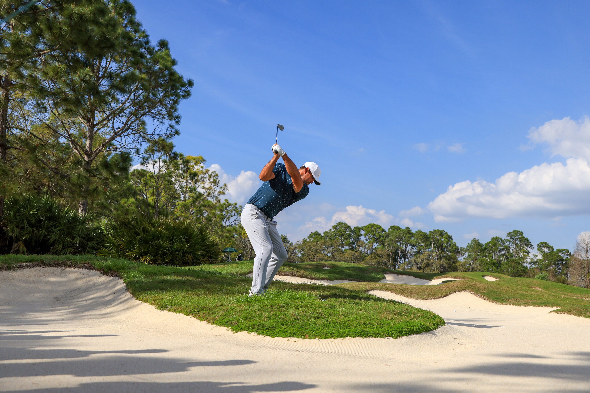  BRADENTON, FLORIDA - FEBRUARY 28: Brooks Koepka of the United States plays a second shot from a bunker on the tenth hole during the final round of World Golf Championships-Workday Championship at The Concession on February 28, 2021 in Bradenton, Flo