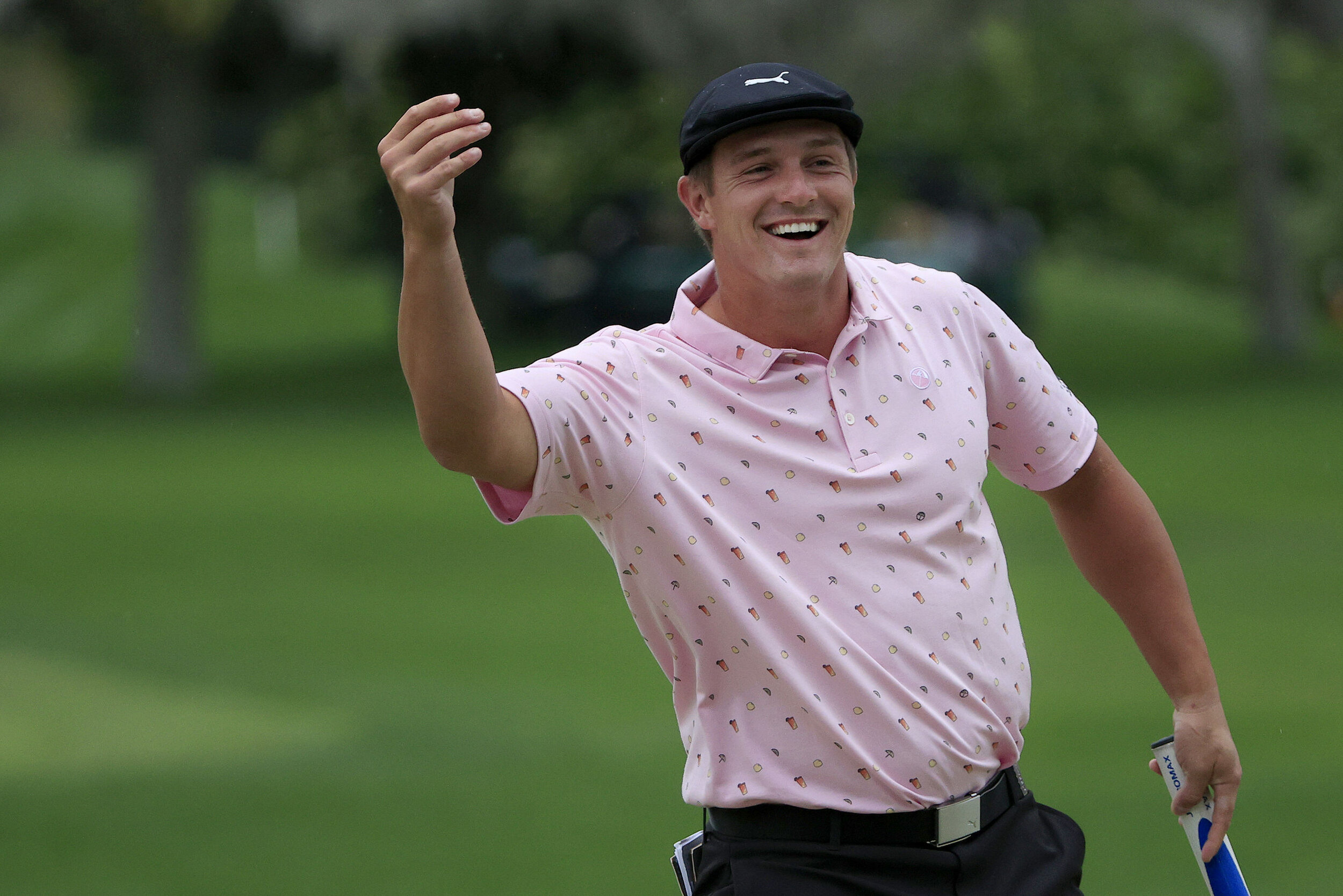  ORLANDO, FLORIDA - MARCH 06: Bryson DeChambeau of the United States smiles as he tosses his golf ball on the 16th hole during the third round of the Arnold Palmer Invitational Presented by MasterCard at the Bay Hill Club and Lodge on March 06, 2021 