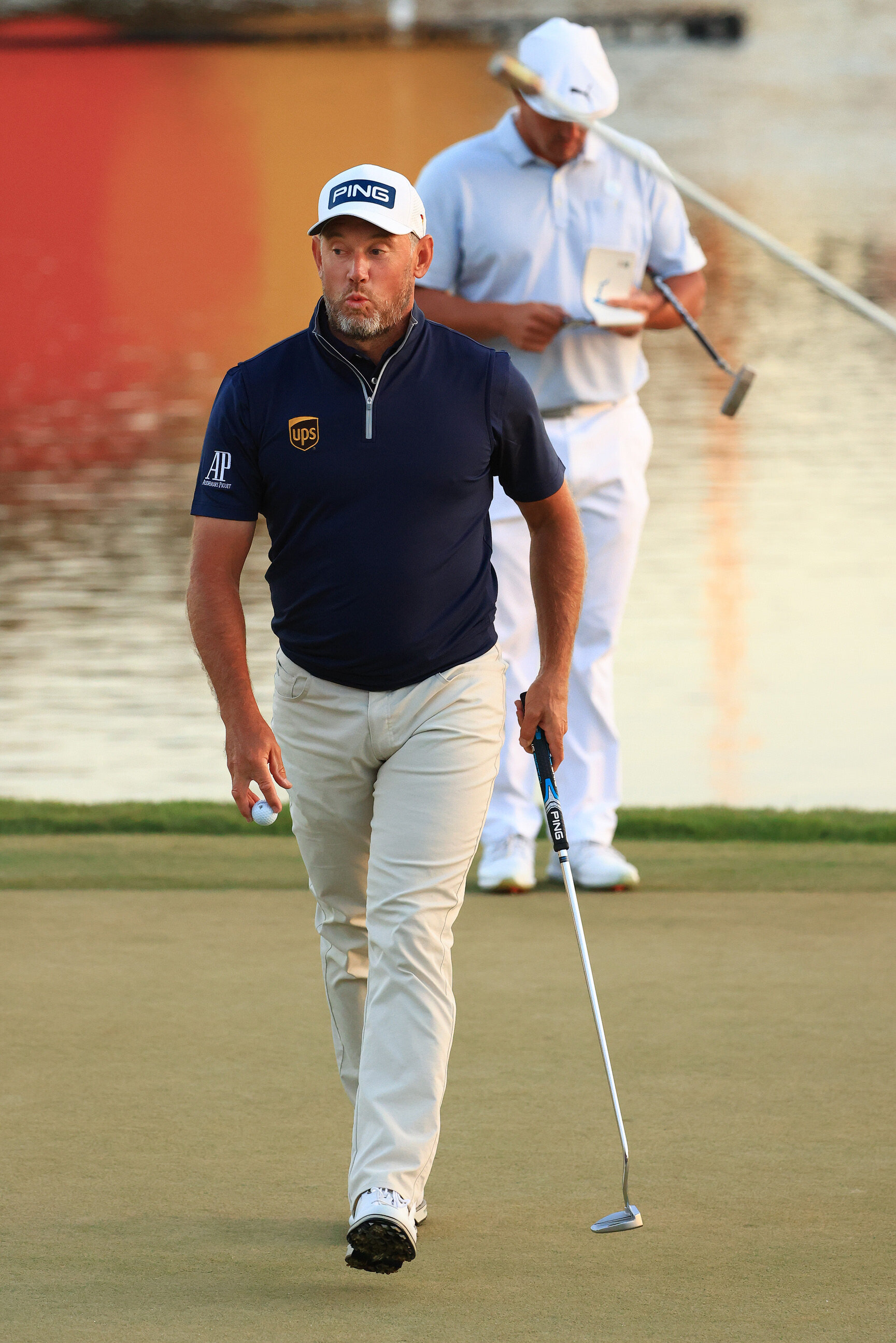  ORLANDO, FLORIDA - MARCH 07: Lee Westwood of England reacts after making a putt for par on the 18th green during the final round of the Arnold Palmer Invitational Presented by MasterCard at the Bay Hill Club and Lodge on March 07, 2021 in Orlando, F