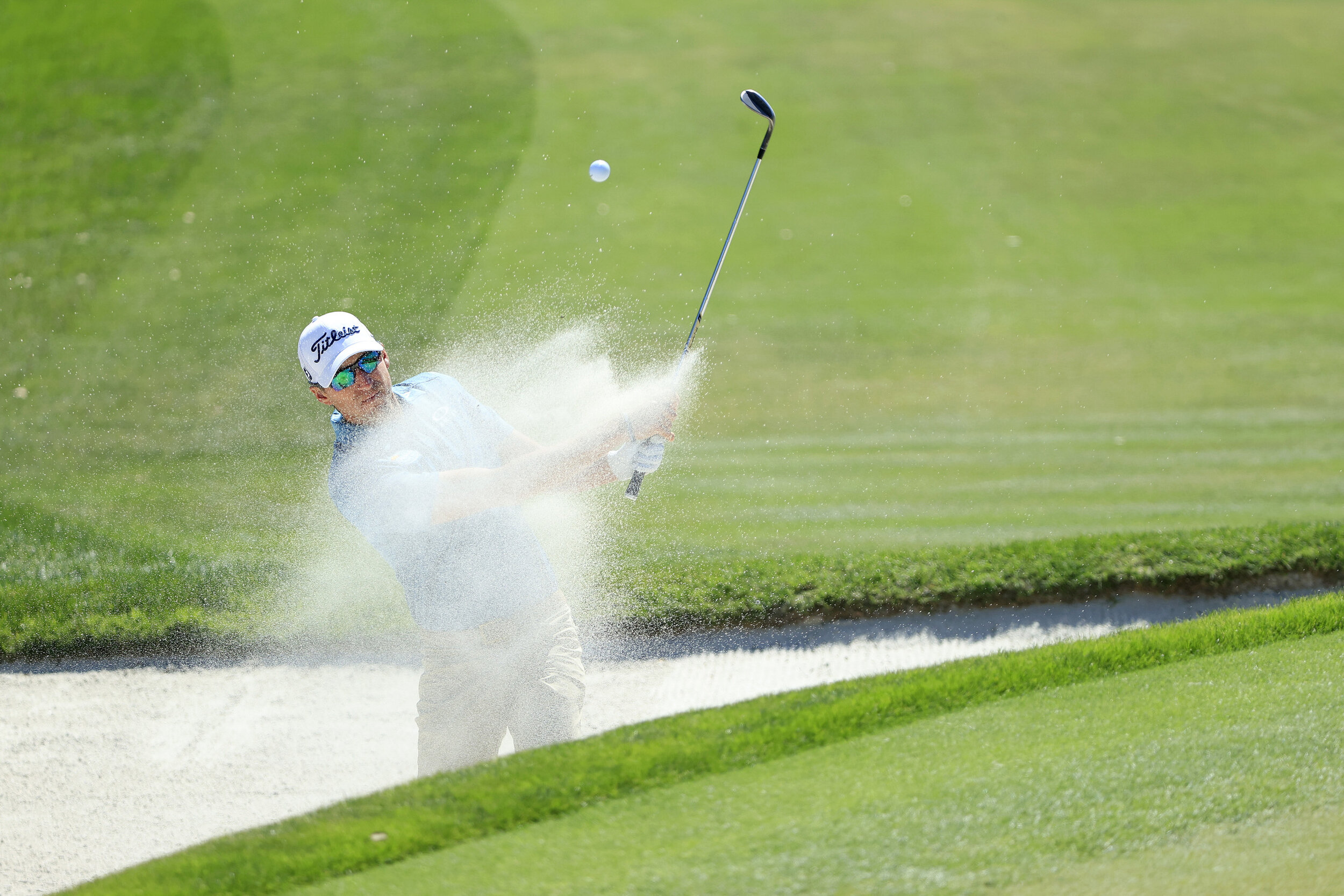  ORLANDO, FLORIDA - MARCH 07: Richy Werenski of the United States plays a shot from a bunker on the first hole during the final round of the Arnold Palmer Invitational Presented by MasterCard at the Bay Hill Club and Lodge on March 07, 2021 in Orland