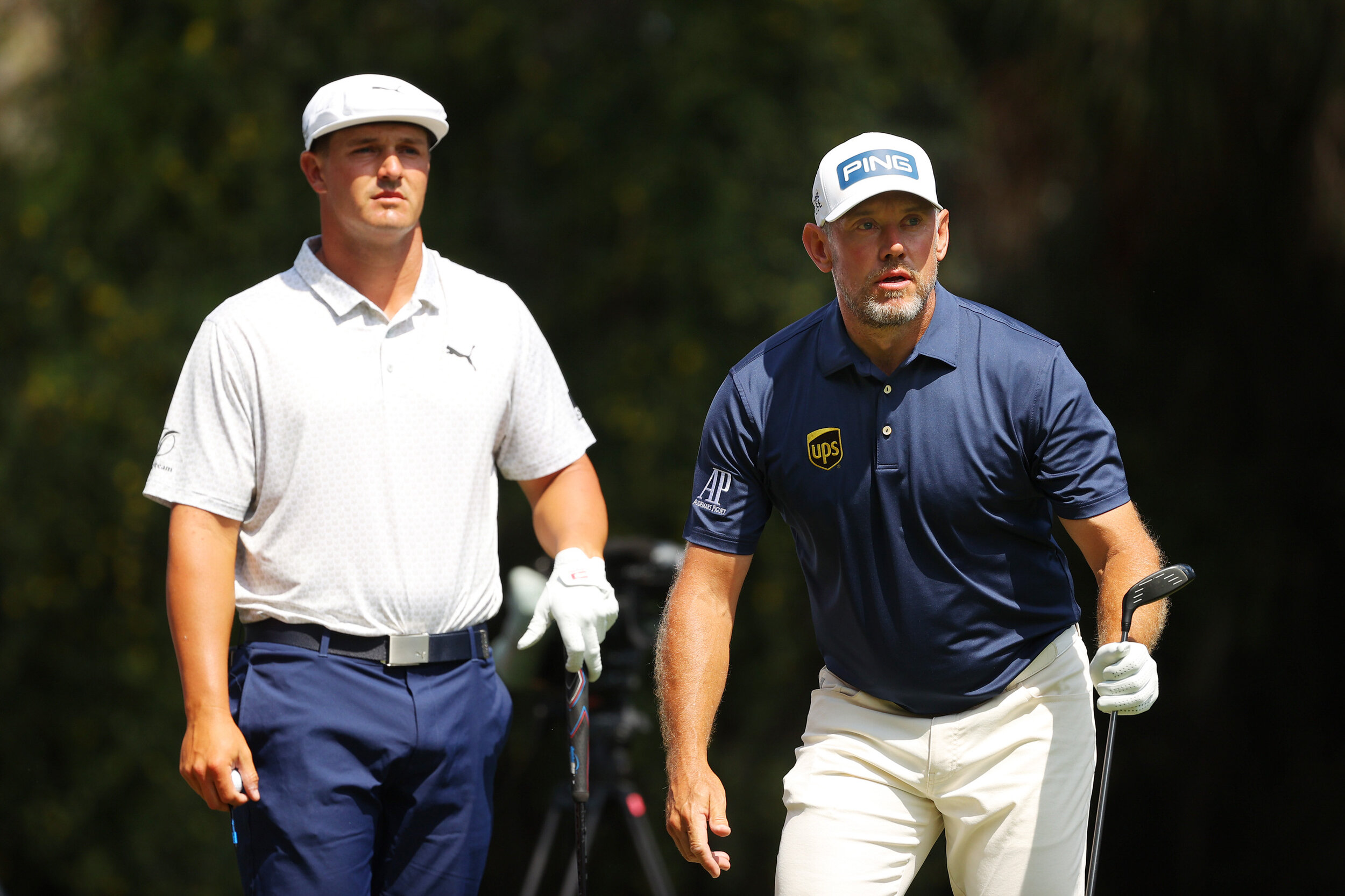 PONTE VEDRA BEACH, FLORIDA - MARCH 14: Bryson DeChambeau of the United States and Lee Westwood of England look on from the second tee during the final round of THE PLAYERS Championship on THE PLAYERS Stadium Course at TPC Sawgrass on March 14, 2021 