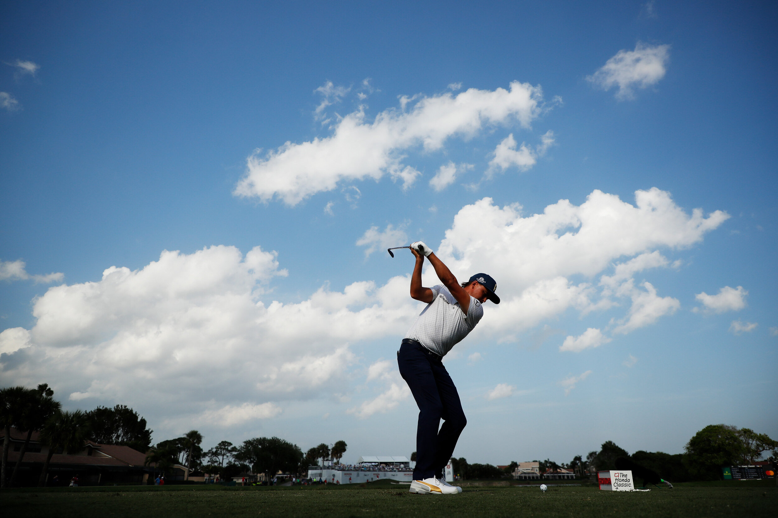  PALM BEACH GARDENS, FLORIDA - MARCH 18: Rickie Fowler of the United States plays his shot from the 15th tee during the first round of The Honda Classic at PGA National Champion course on March 18, 2021 in Palm Beach Gardens, Florida. (Photo by Cliff