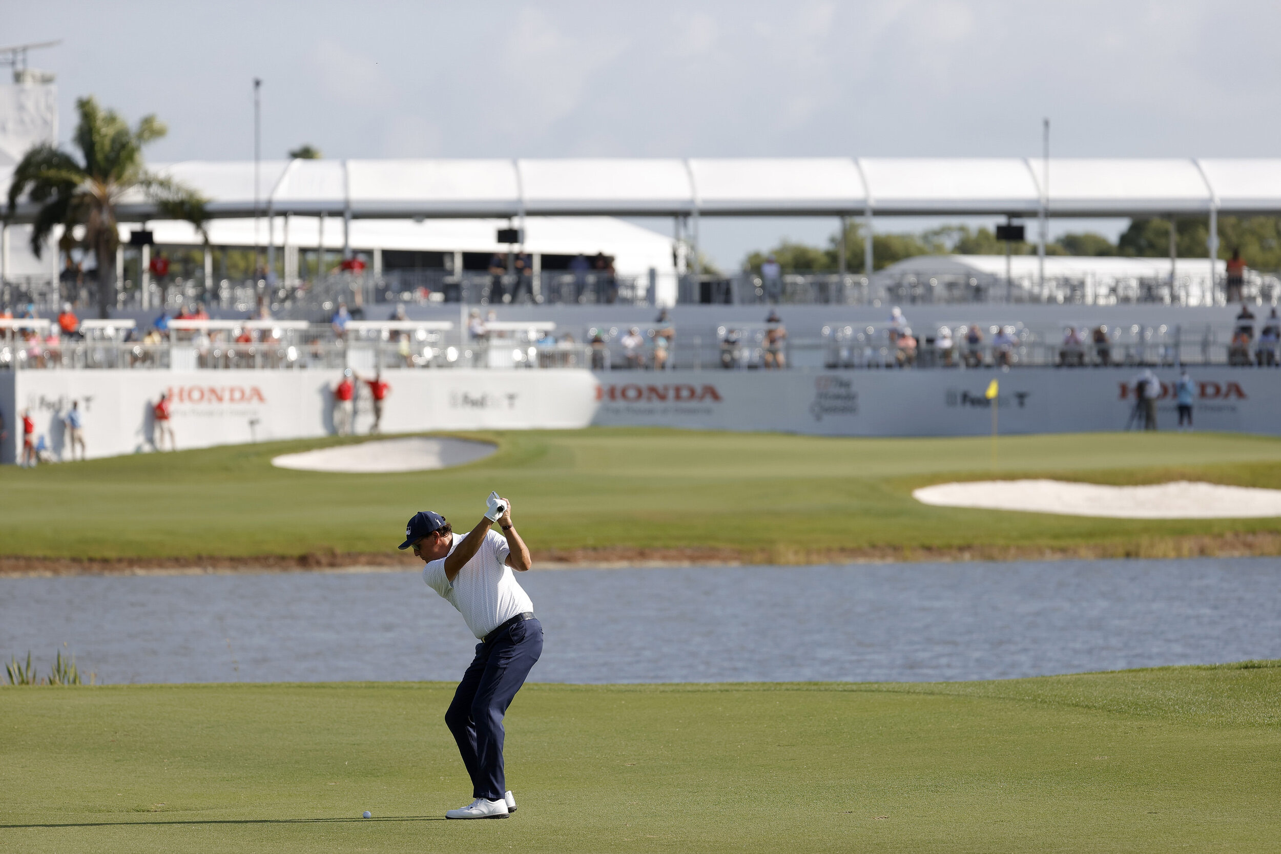  PALM BEACH GARDENS, FLORIDA - MARCH 18: Phil Mickelson of the United States plays a shot on the 16th hole during the first round of The Honda Classic at PGA National Champion course on March 18, 2021 in Palm Beach Gardens, Florida. (Photo by Jared C