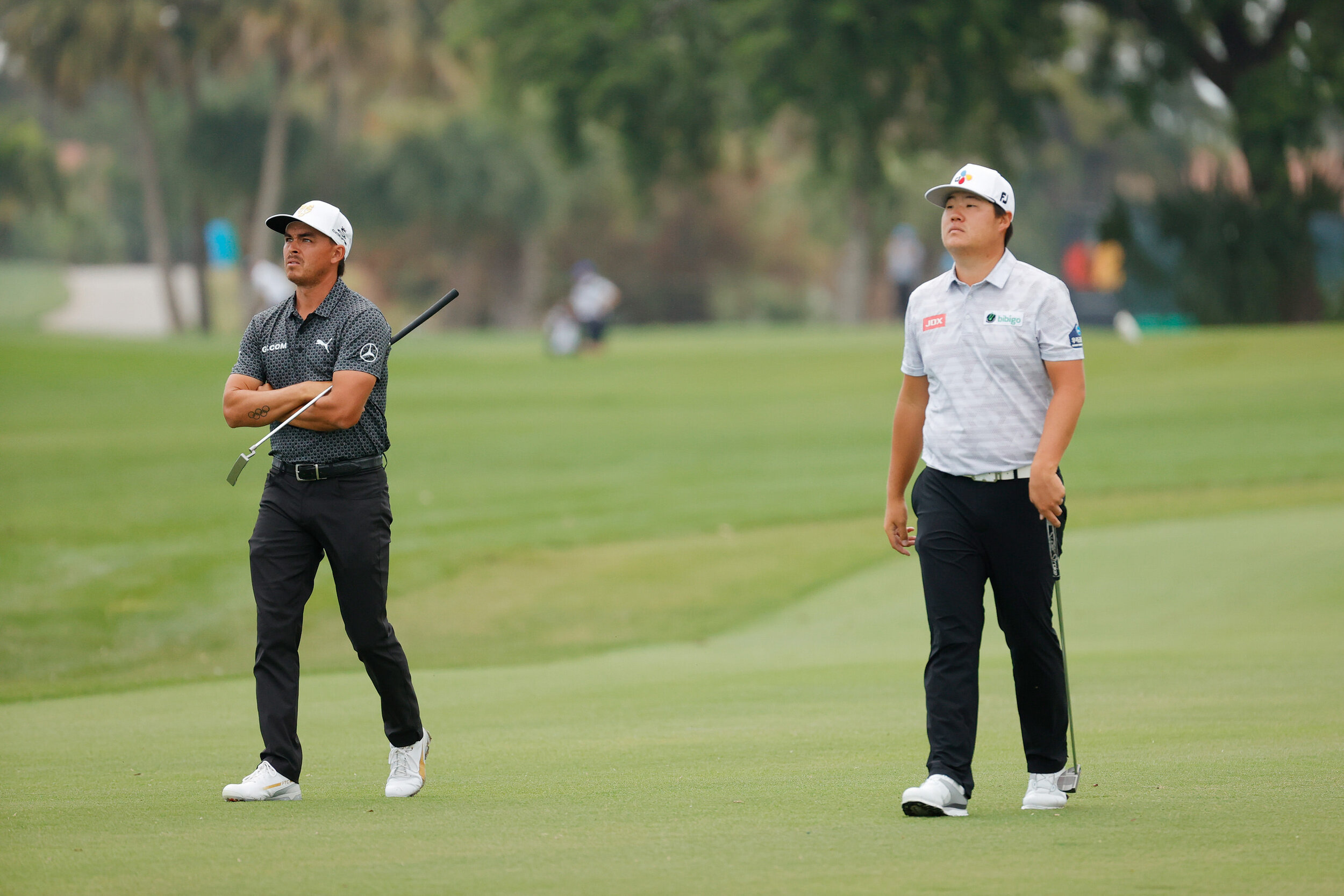  PALM BEACH GARDENS, FLORIDA - MARCH 19: Rickie Fowler of the United States and Sungjae Im of South Korea look on over the 11th hole during the second round of The Honda Classic at PGA National Champion course on March 19, 2021 in Palm Beach Gardens,