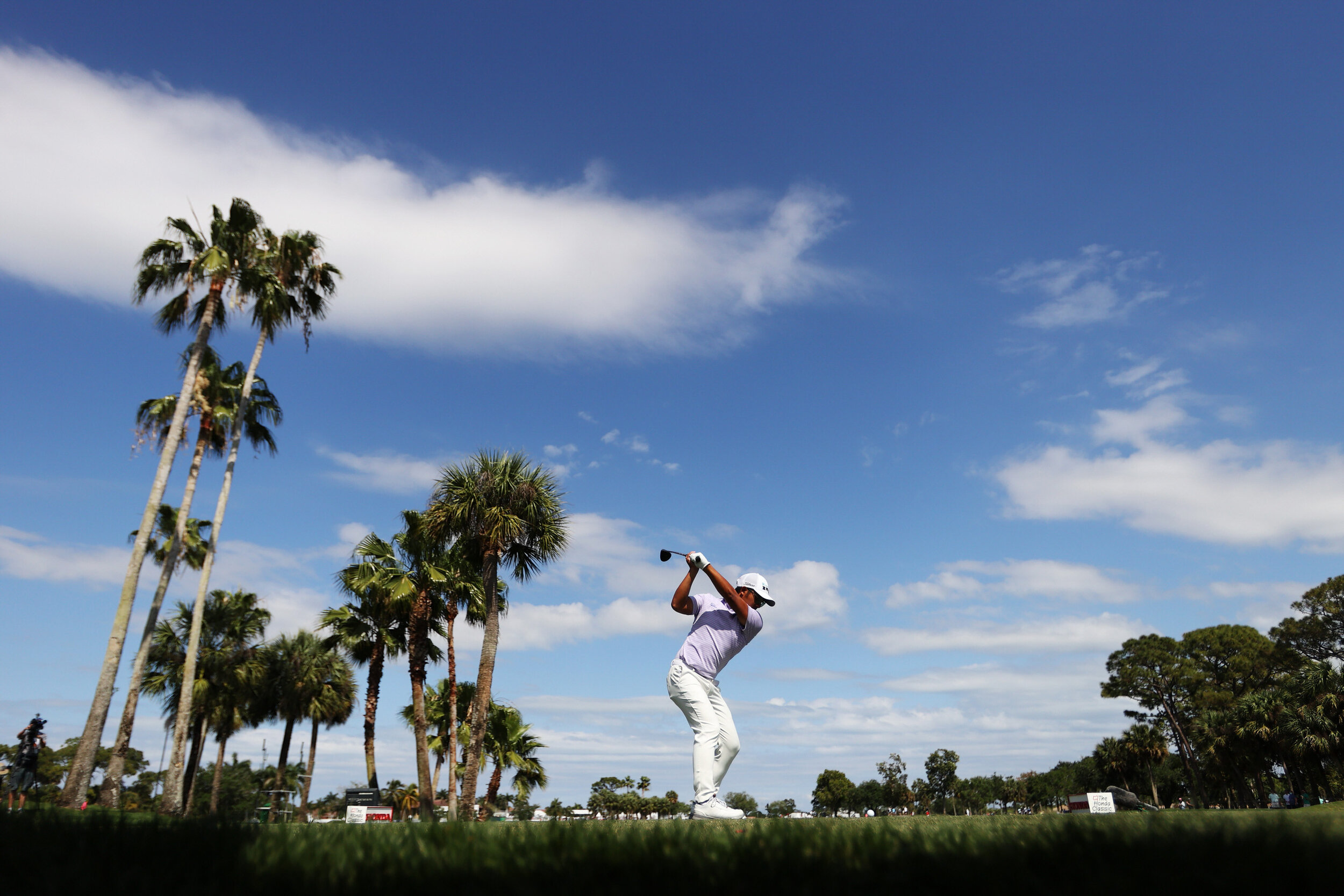  PALM BEACH GARDENS, FLORIDA - MARCH 21: C.T. Pan of Taiwan plays his shot from the ninth tee during the final round of The Honda Classic at PGA National Champion course on March 21, 2021 in Palm Beach Gardens, Florida. (Photo by Cliff Hawkins/Getty 