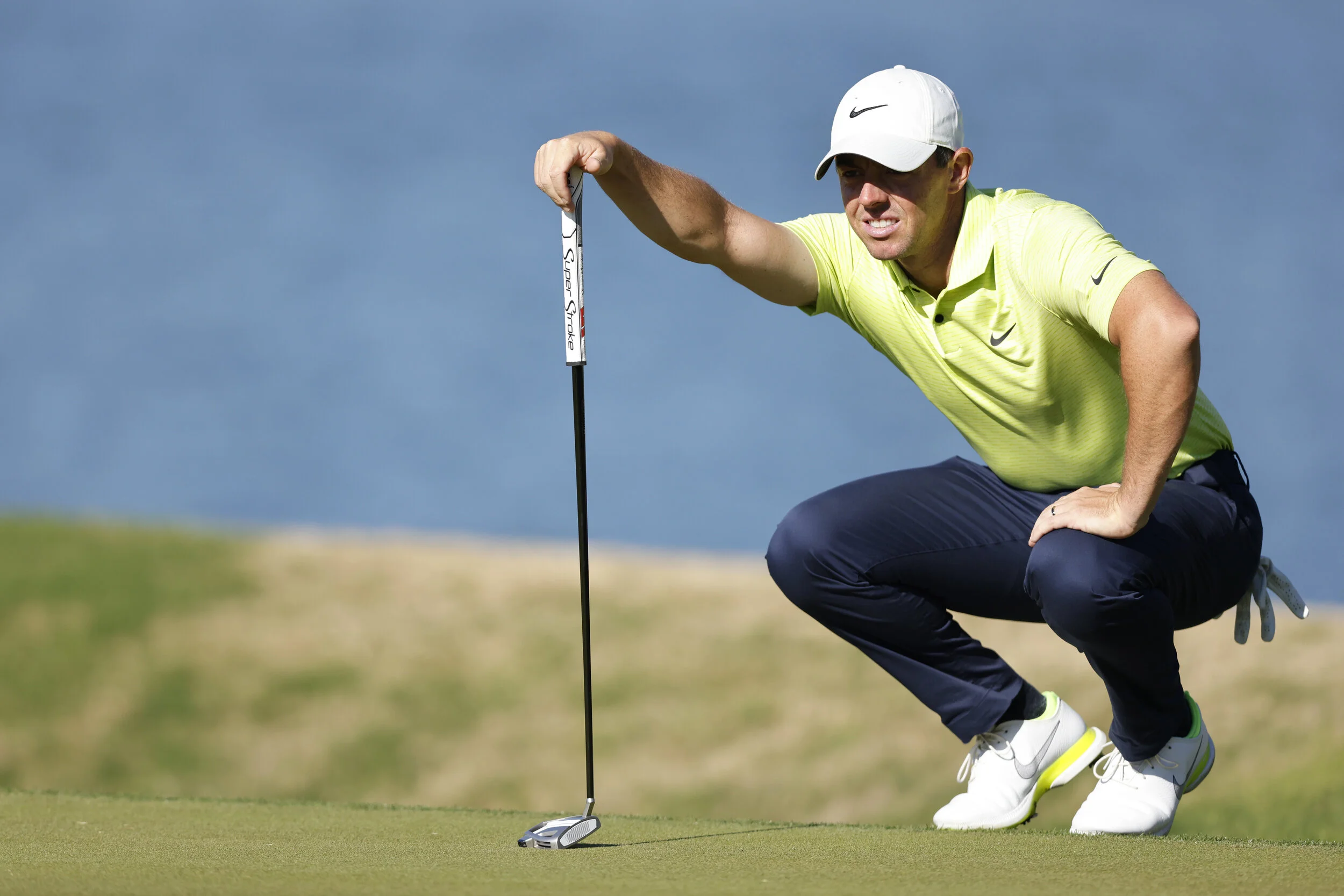 McIlroy promises graft with Cowen as he keeps Match Play hopes alive