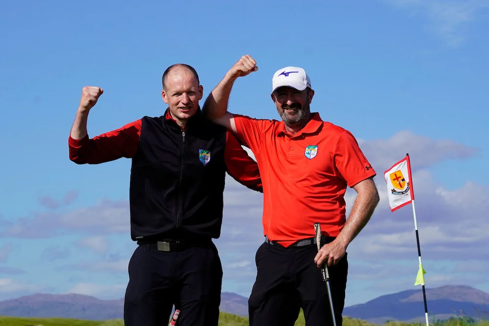 Chris Downey (left) and David Kelly celebrate Berehaven’s historic win in the AIG Jimmy Bruen Shield at Donegal GC. © Golffile | Thos Caffrey