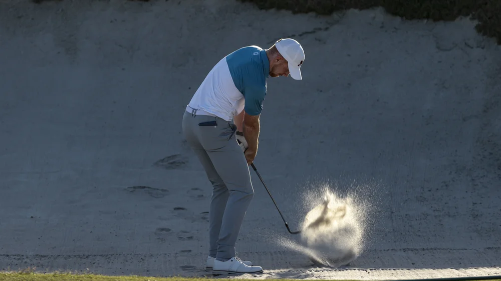 John Murphy hits a bunker shot on the 14th hole during Singles at the 2021 Walker Cup at Seminole Golf Club in Juno Beach, Fla. on Saturday, May 8, 2021. (Chris Keane/USGA)