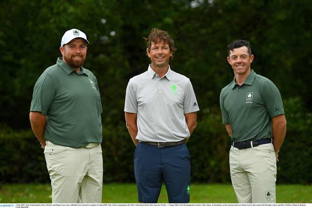Team Ireland’s Shane Lowry with coach Neil Manchip, centre, and Rory McIlroy Photo by Ramsey Cardy/Sportsfile