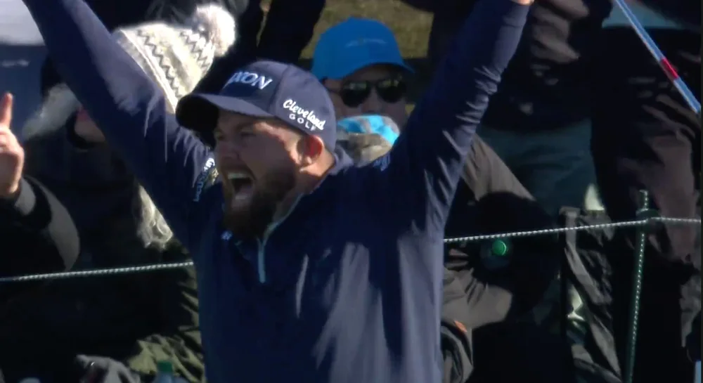 Shane Lowry celebrates his hole-in-one on Sunday