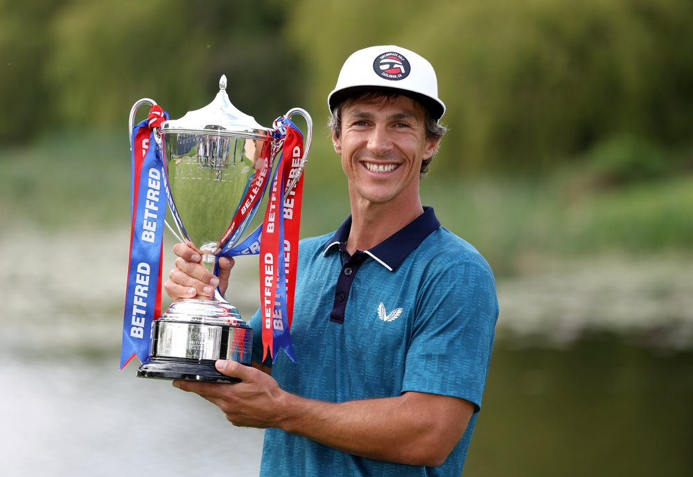 SUTTON COLDFIELD, ENGLAND - MAY 08: Thorbjorn Olesen of Denmark poses with the trophy after winning the Betfred British Masters hosted by Danny Willett at The Belfry on May 08, 2022 in Sutton Coldfield, England. (Photo by Richard Heathcote/Getty Imag