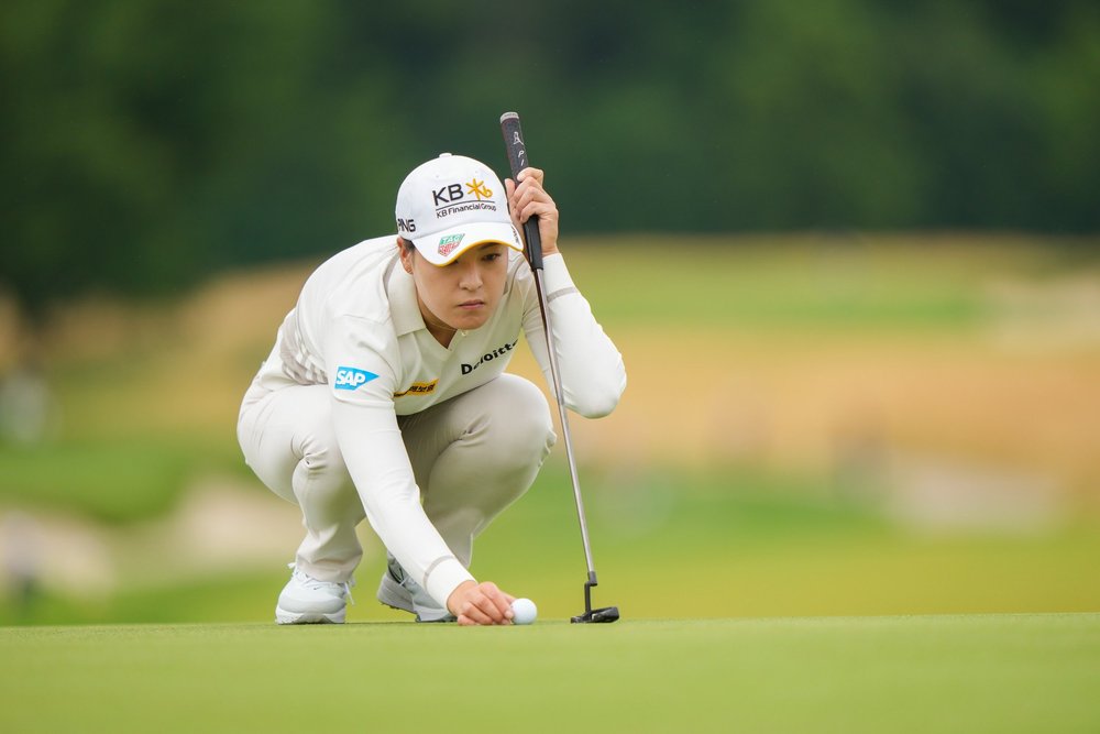 In Gee Chun of the Republic of Korea lines her putt on the ninth hole during the first round for the 2022 KPMG Women's PGA Championship at Congressional Country Club on June 23, 2022 in Bethesda, Maryland. (Photo by Darren Carroll/PGA of America)