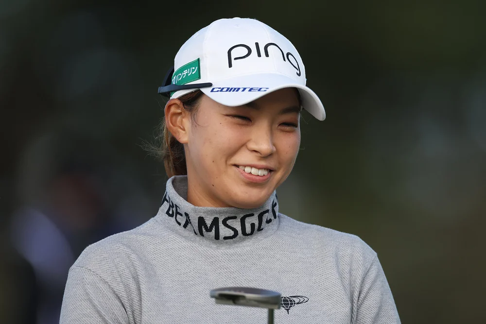 GULLANE, SCOTLAND - AUGUST 04: Hinako Shibuno of Japan looks on from the ninth tee during Day One of the AIG Women's Open at Muirfield on August 04, 2022 in Gullane, Scotland. (Photo by Oisin Keniry/R&A/R&A via Getty Images)