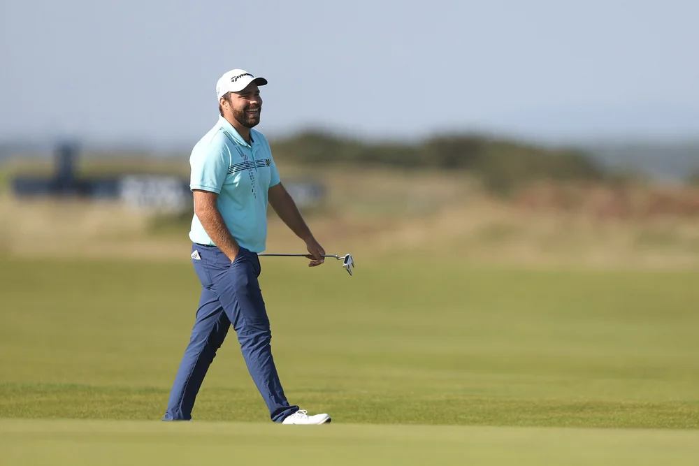 ST ANDREWS, SCOTLAND - SEPTEMBER 29: Romain Langasque of France smiles on course on Day One of the Alfred Dunhill Links Championship on the Old Course St. Andrews on September 29, 2022 in St Andrews, Scotland. (Photo by Oisin Keniry/Getty Images)