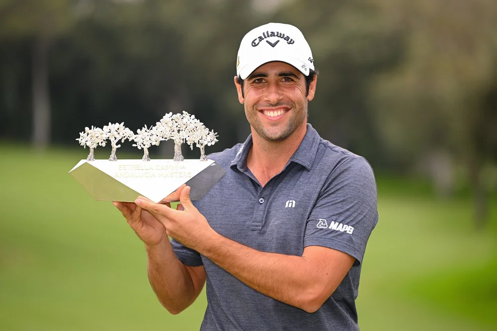 CADIZ, SPAIN - OCTOBER 16: Adrian Otaegui of Spain poses for a photograph as they celebrate with the Andalucia Masters Trophy on day four of the Estrella Damm N.A. Andalucía Masters at Real Club Valderrama on October 16, 2022 in Cadiz, Spain. (Photo