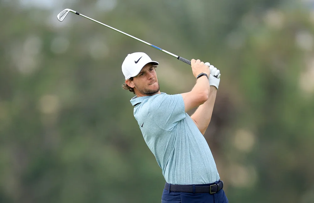 Thomas Pieters of Belgium plays his second shot on the 13th hole on day one of the Hero Dubai Desert Classic on the Majlis Course at The Emirates Golf Club. (Photo by David Cannon/Getty Images)