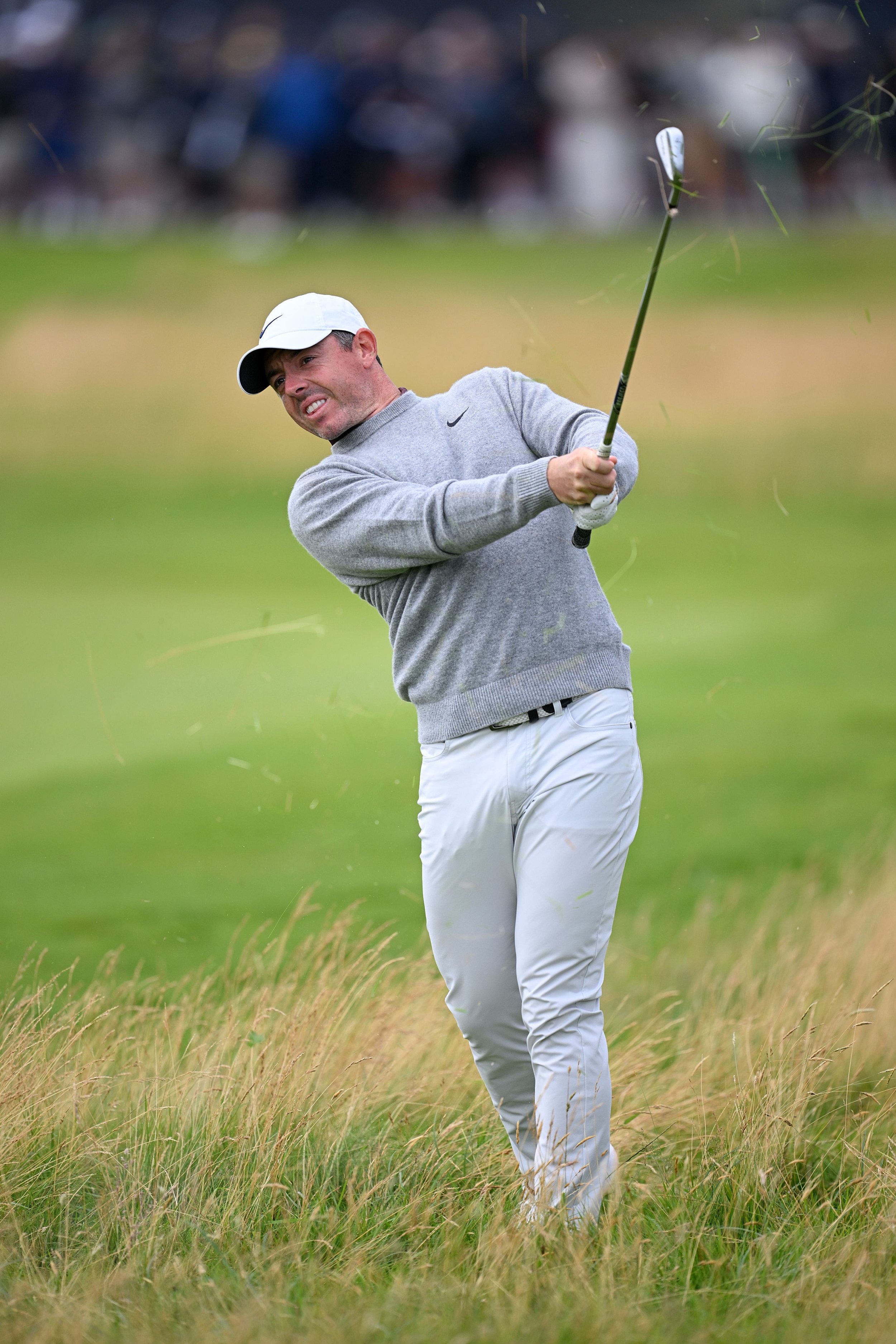 Lowry and McIlroy dig deep to keep leaders in sight at The Open