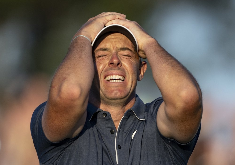 Рори Макилрой празднует победу