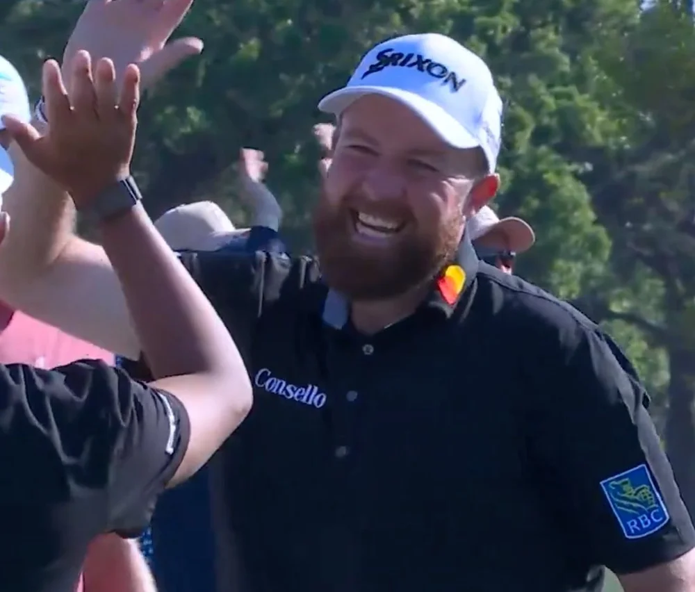 Shane Lowry celebrates after sinking a hole-in-one at the Houston Open.