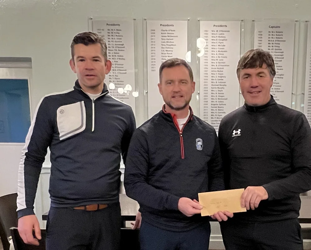 Derek Sheahan (Captain Castletroy 2023) presenting Tim Rice with his prize alongside Gary Howie (Head Professional Castletroy GC)