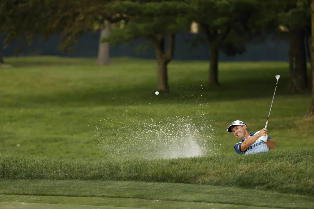 Padraig Harrington plays a shot out of a bunker on the seventh hole during the final round at the 2022 U.S. Senior Open at Saucon Valley C.C. (Old Course) in Bethlehem, Pa. on Sunday, June 26, 2022. (Chris Keane/USGA)