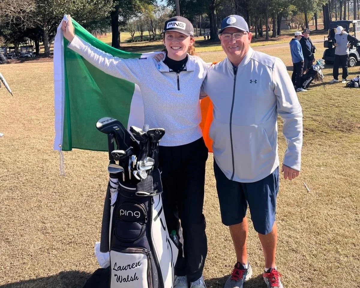 Lauren Walsh celebrates winning her LPGA Tour card with caddie, Gary Du Plooy