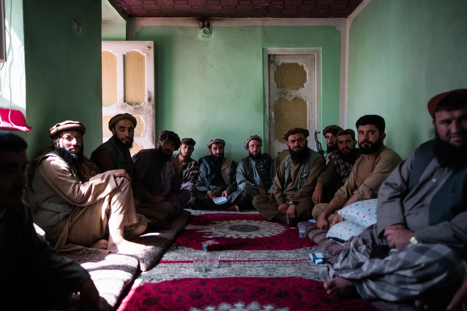  Haji Abdul Qadir, a Taliban commander who runs the mine, and his soldiers  