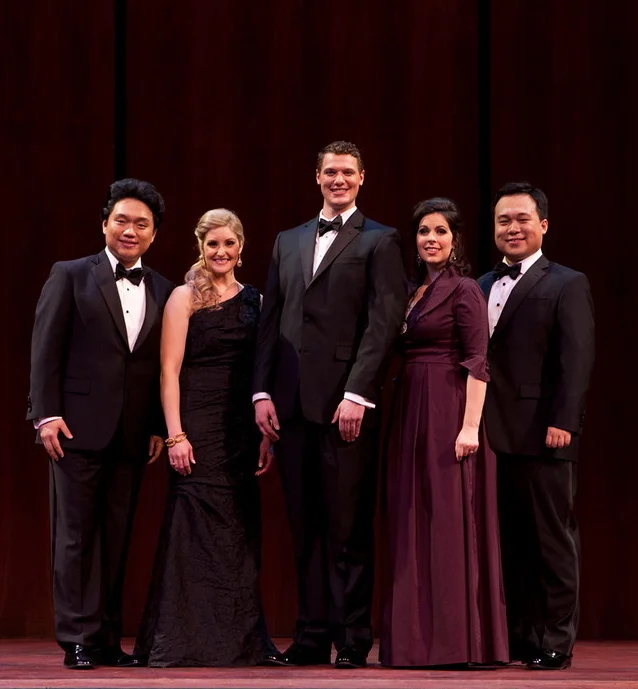 The winners of the 2014 Metropolitan Opera National Council Auditions, from left to right: Yi Li (tenor), Julie Adams (soprano), Patrick Guetti (bass), Amanda Woodbury (soprano), and Ao Li (bass-baritone). — Photo: Fay Fox