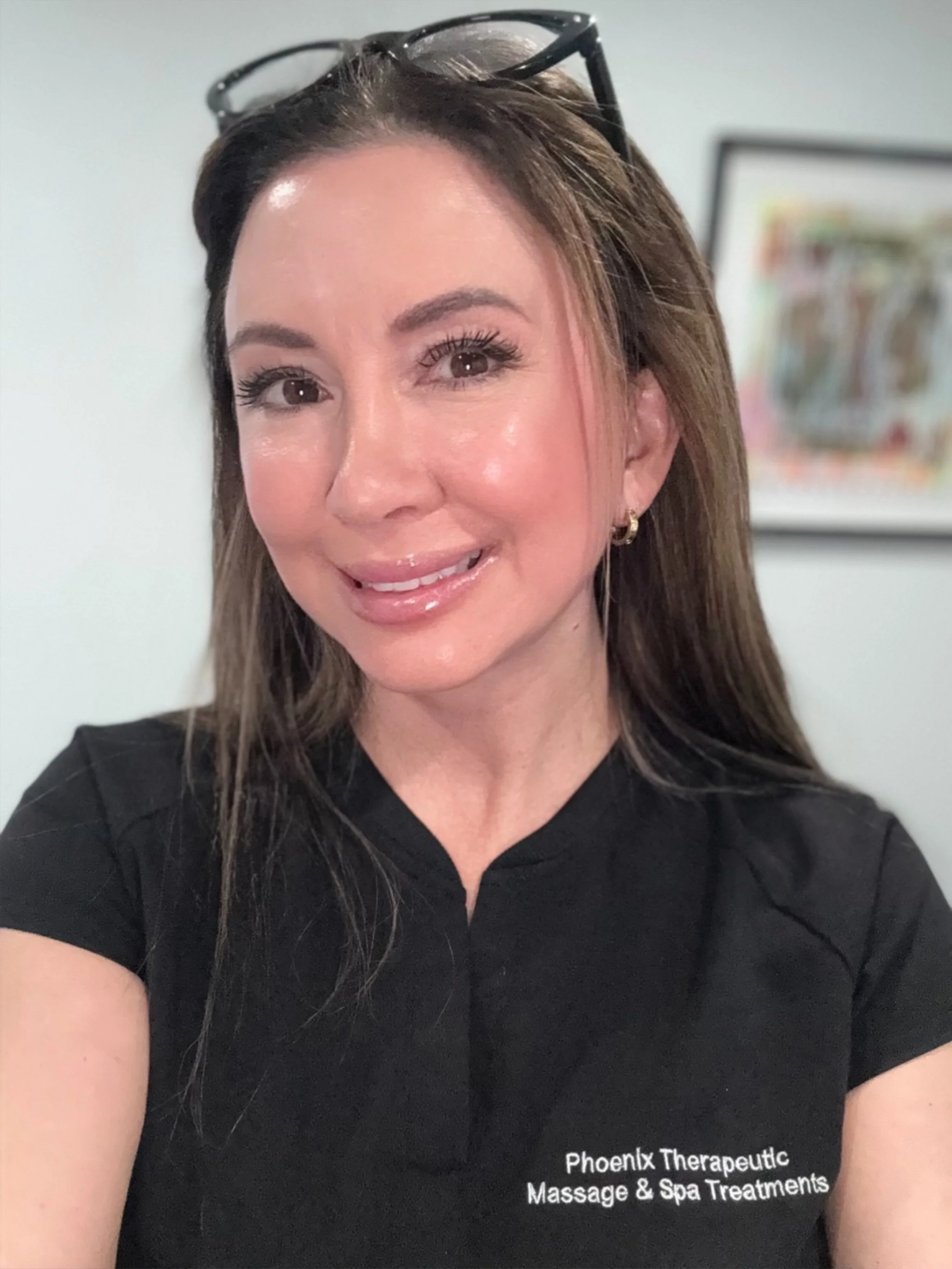 Kelly, LMT, LE, and owner of Phoenix Therapeutic Massage & Spa Treatments in Arcadia Phoenix