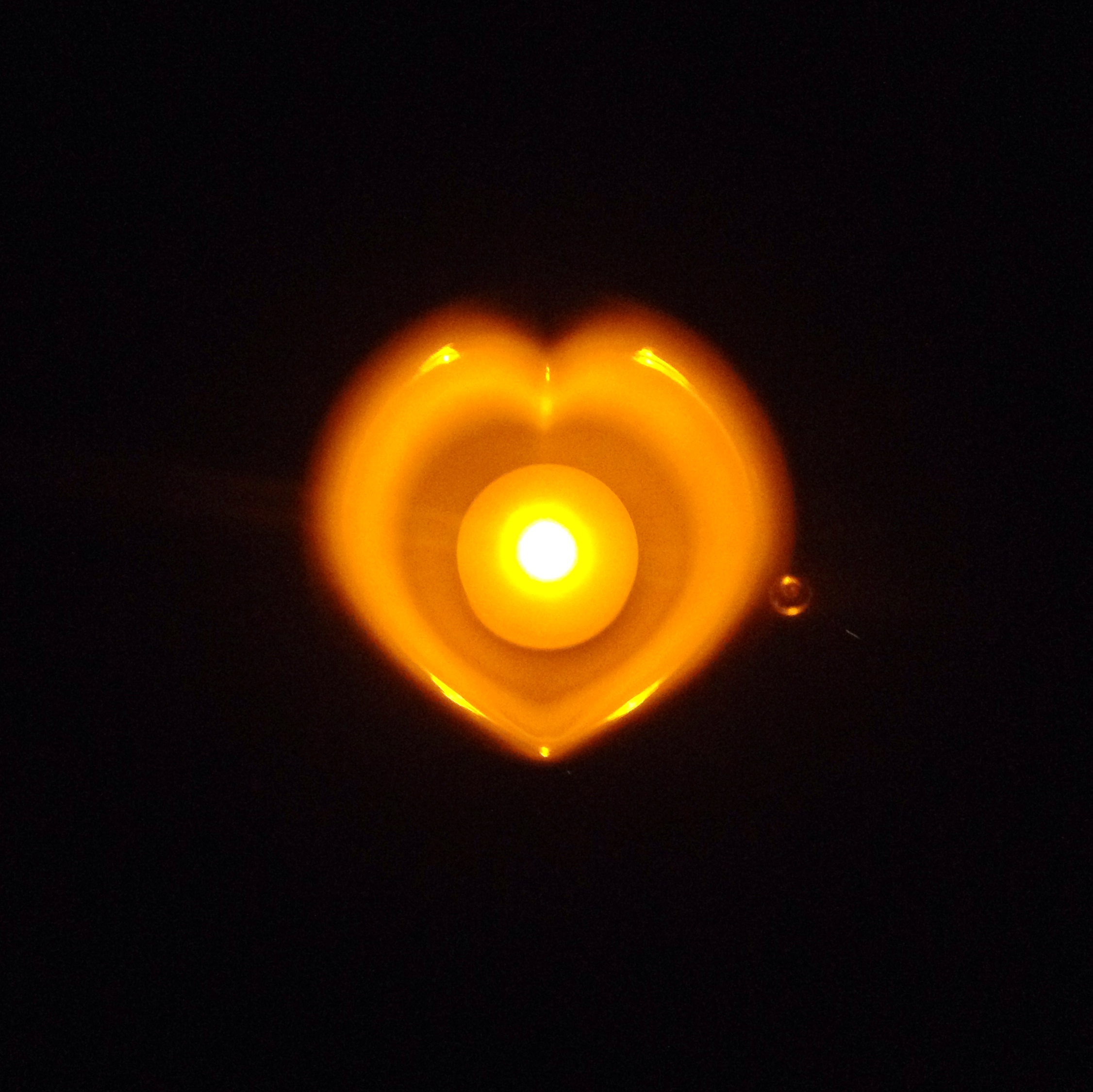 The idea of illuminating one of our lovely heart shaped tea cups with the warmth of a candle came to us from one of our supporters who brightens up her home (her kitchen) in this way – see the photo above for the glowing light. A heart shaped tea cup can brighten up anyone's day!