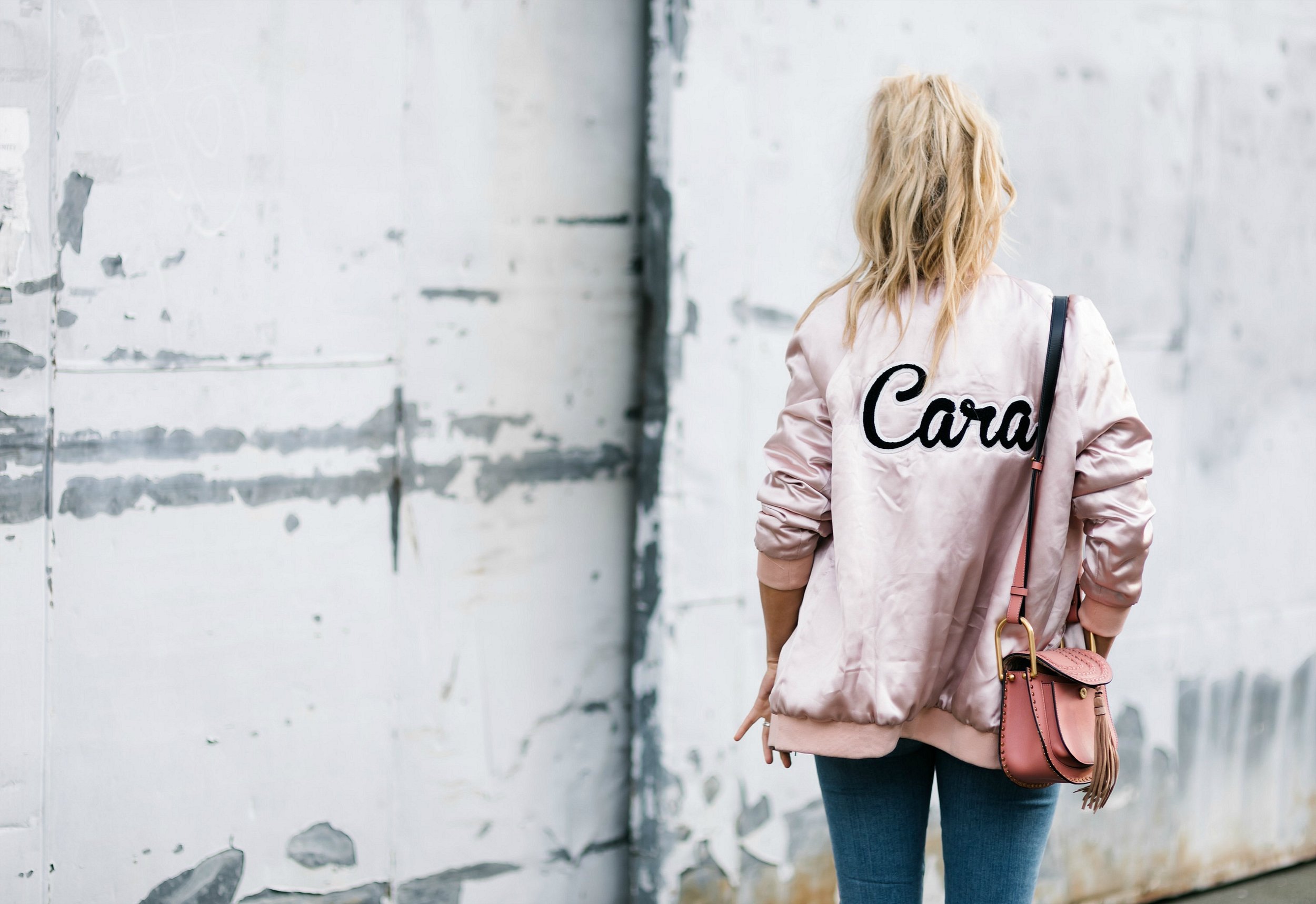 Photos by Allison Kuhl Brunette The Label Courtney Bomber , Paige Denim Jeans, Chloé Bag, Céline Shades, Isabel Marant Etoile Tee, Christian Louboutin Heels.