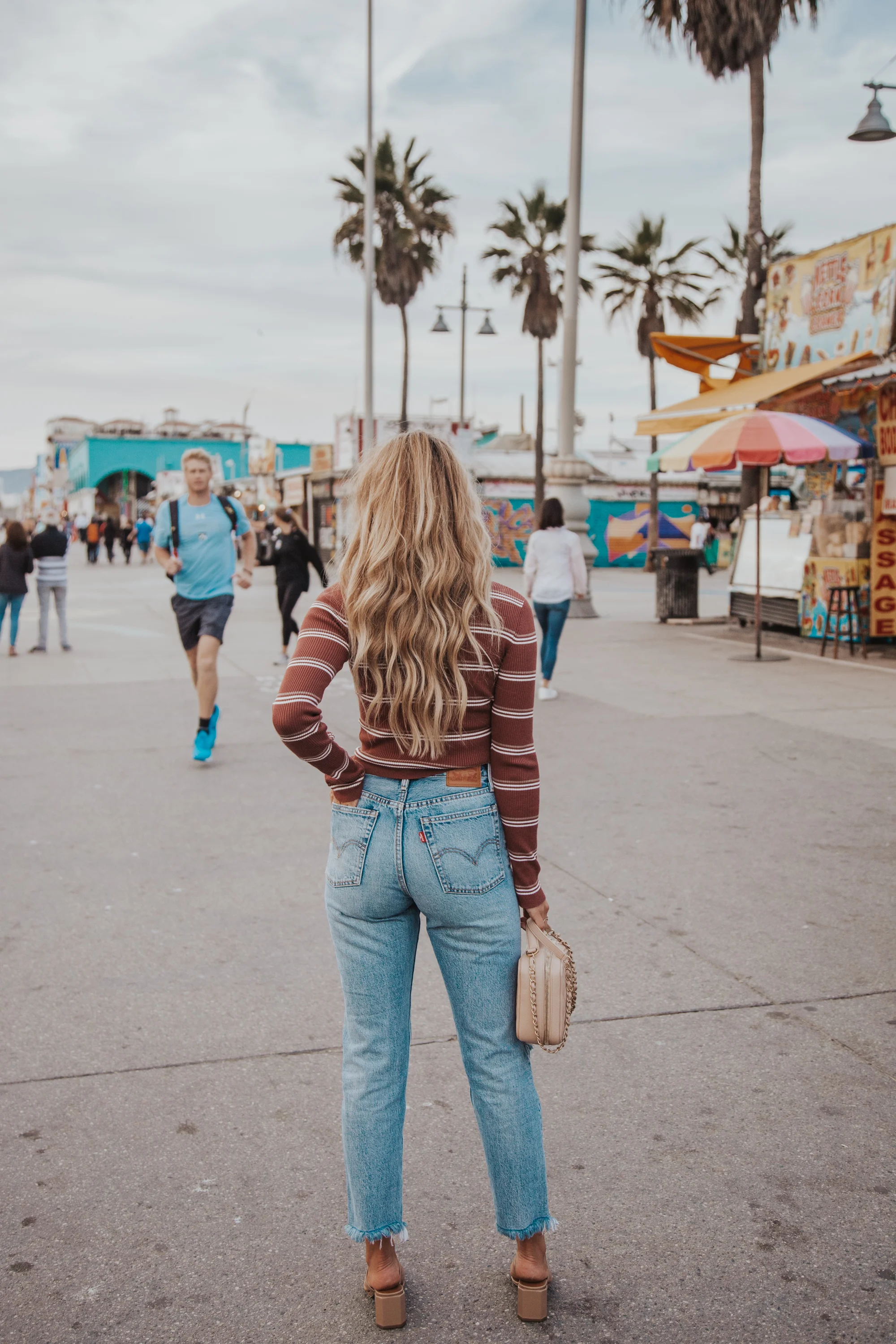 Photos by Paige Owen Lulus Top, Levi’s Jeans , By Far Shoes