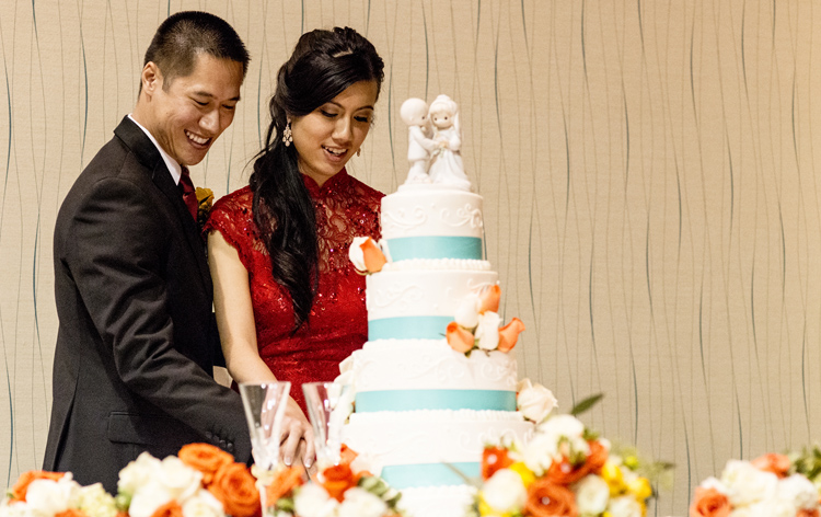 Modern Qipao Cheongsam on real bride at cake-cutting