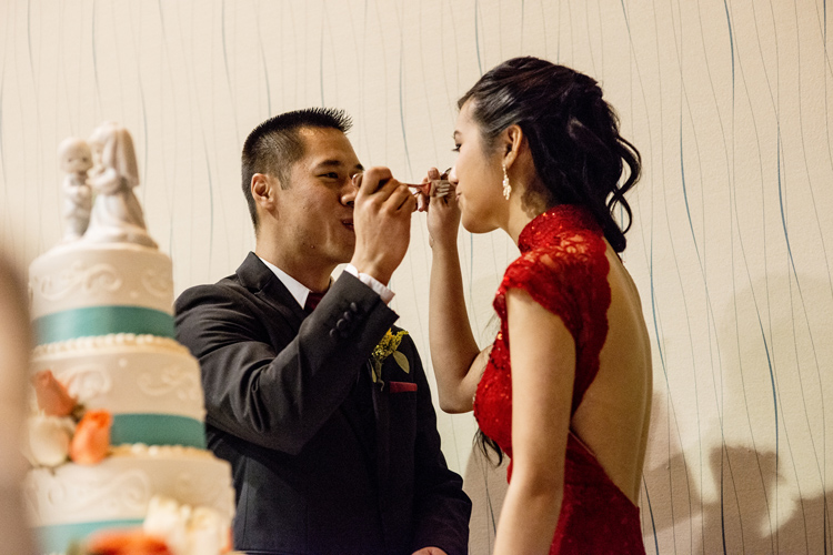 Modern Qipao Cheongsam on real bride at cake-cutting