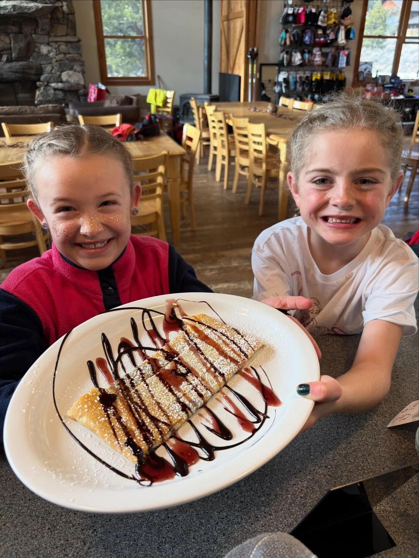 You too could be this excited for a sweet crepe! About an inch of fresh snow so we rolled Busy Beavers and the Pass. Still thin, but fun. Soups and crepes in the Lodge. $10 trail passes. No dogs on trails yet.