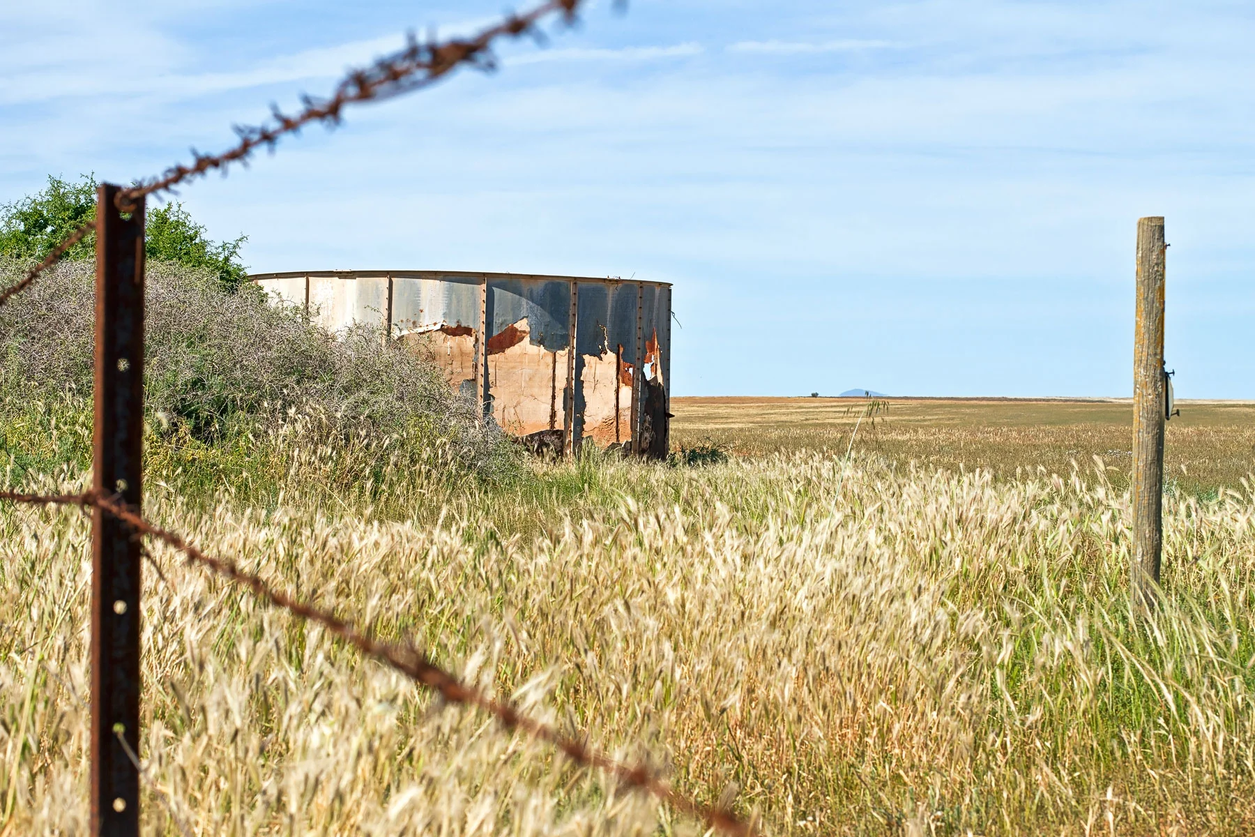 1 barbed wire rustde water tank.jpg