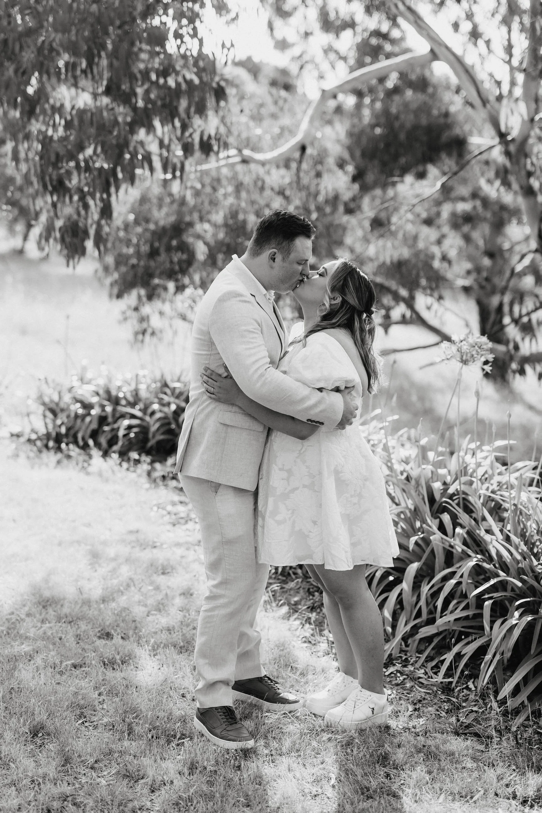 Magnolia Farm Elopement 001 black and white kiss.jpg