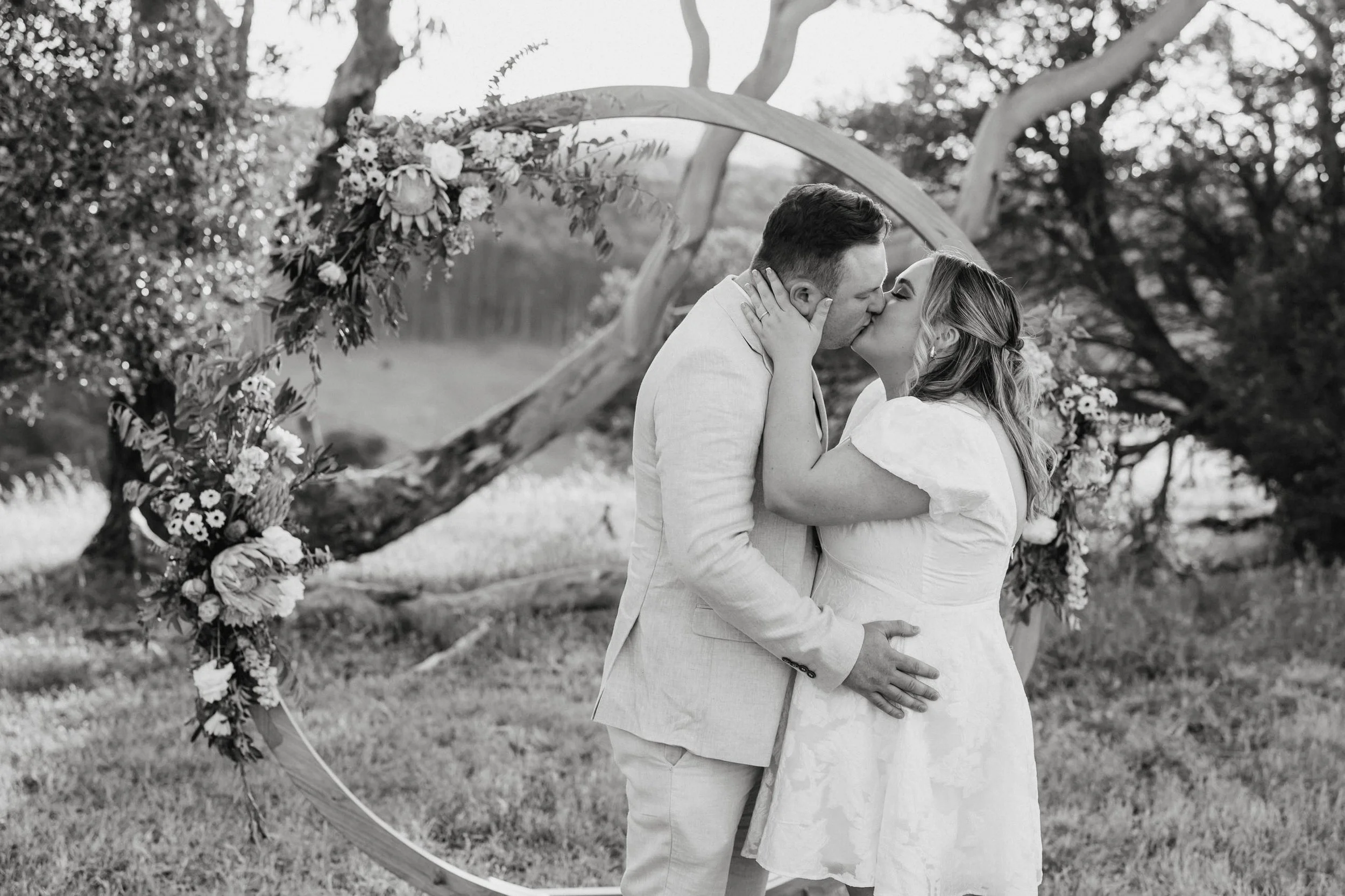 Magnolia Farm Elopement 036 first kiss black and white.jpg