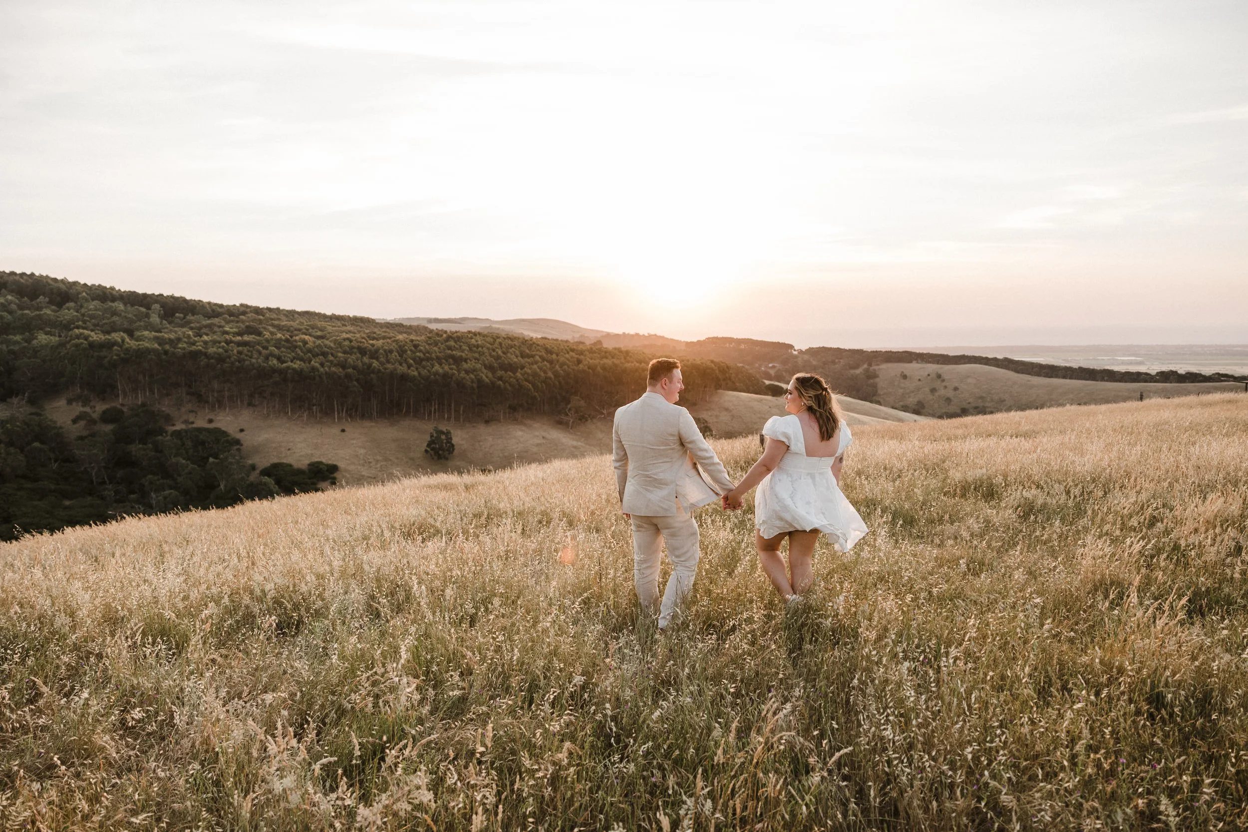 Magnolia Farm Elopement 048 sunset portrait walking through a field.jpg
